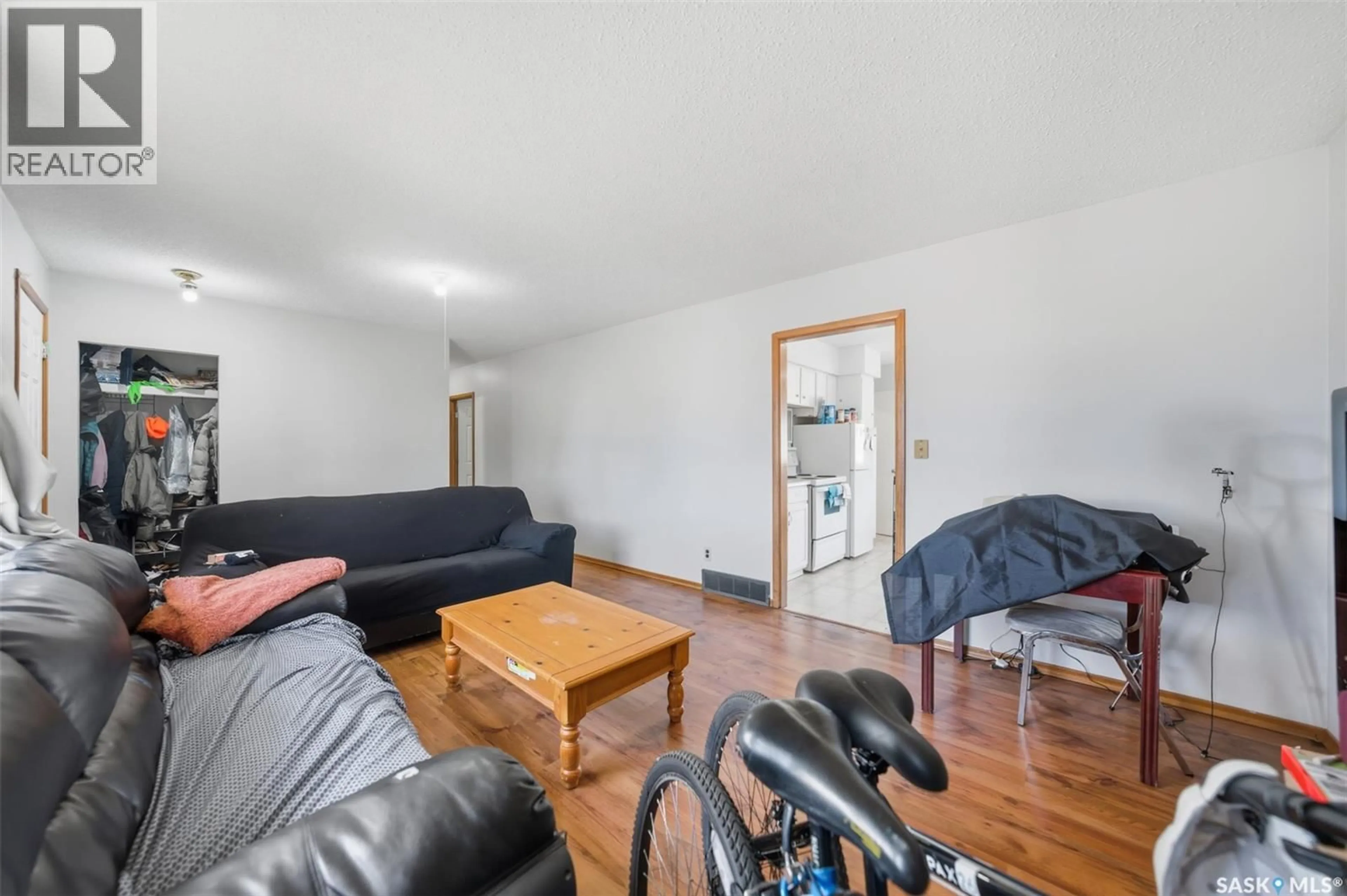 Living room with furniture, unknown for 1051 109TH STREET, North Battleford Saskatchewan S9A2E3