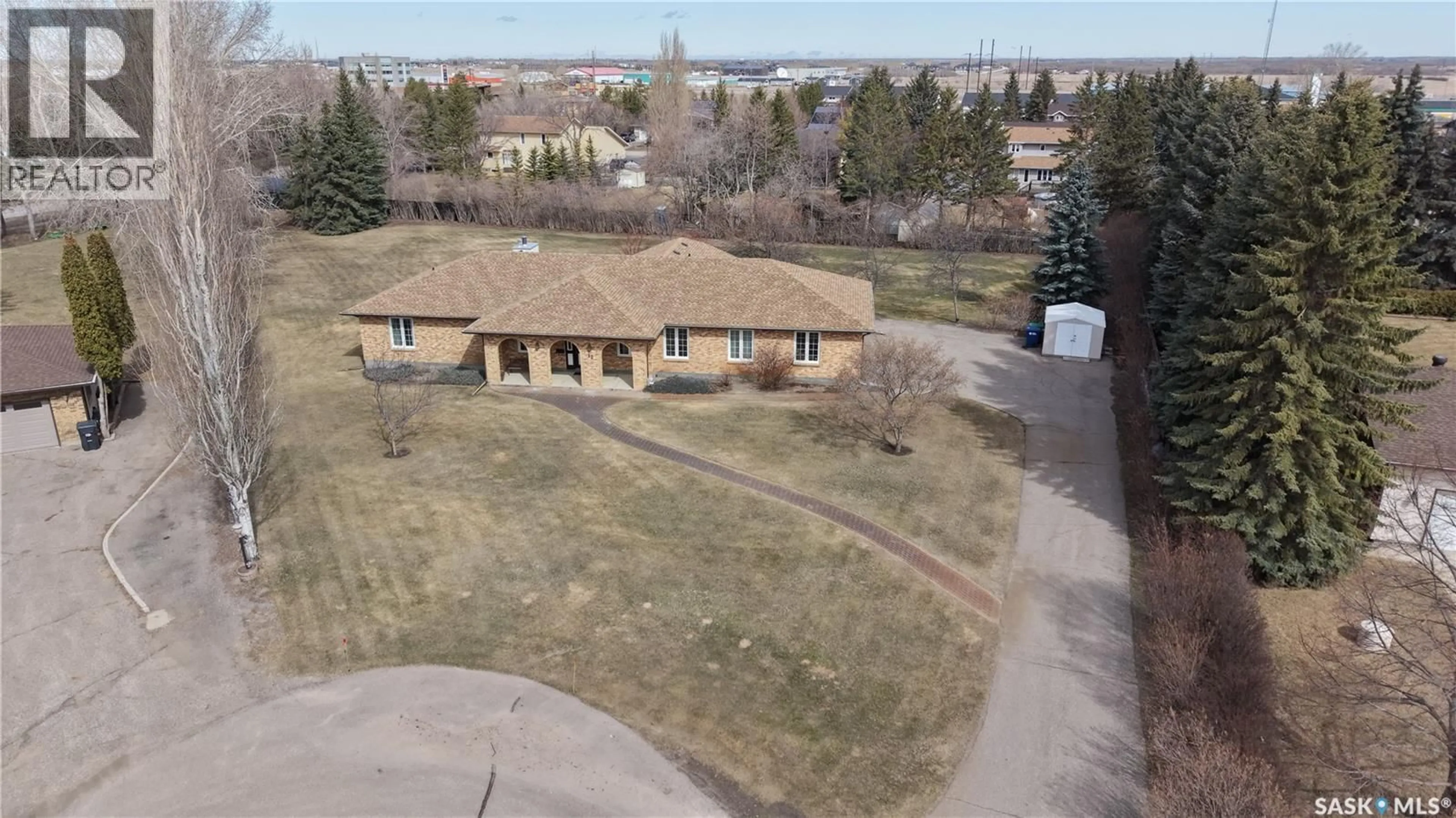 A pic from outside/outdoor area/front of a property/back of a property/a pic from drone, street for 12 PEARL CRESCENT, Edenwold Rm No.158 Saskatchewan S4L1A5