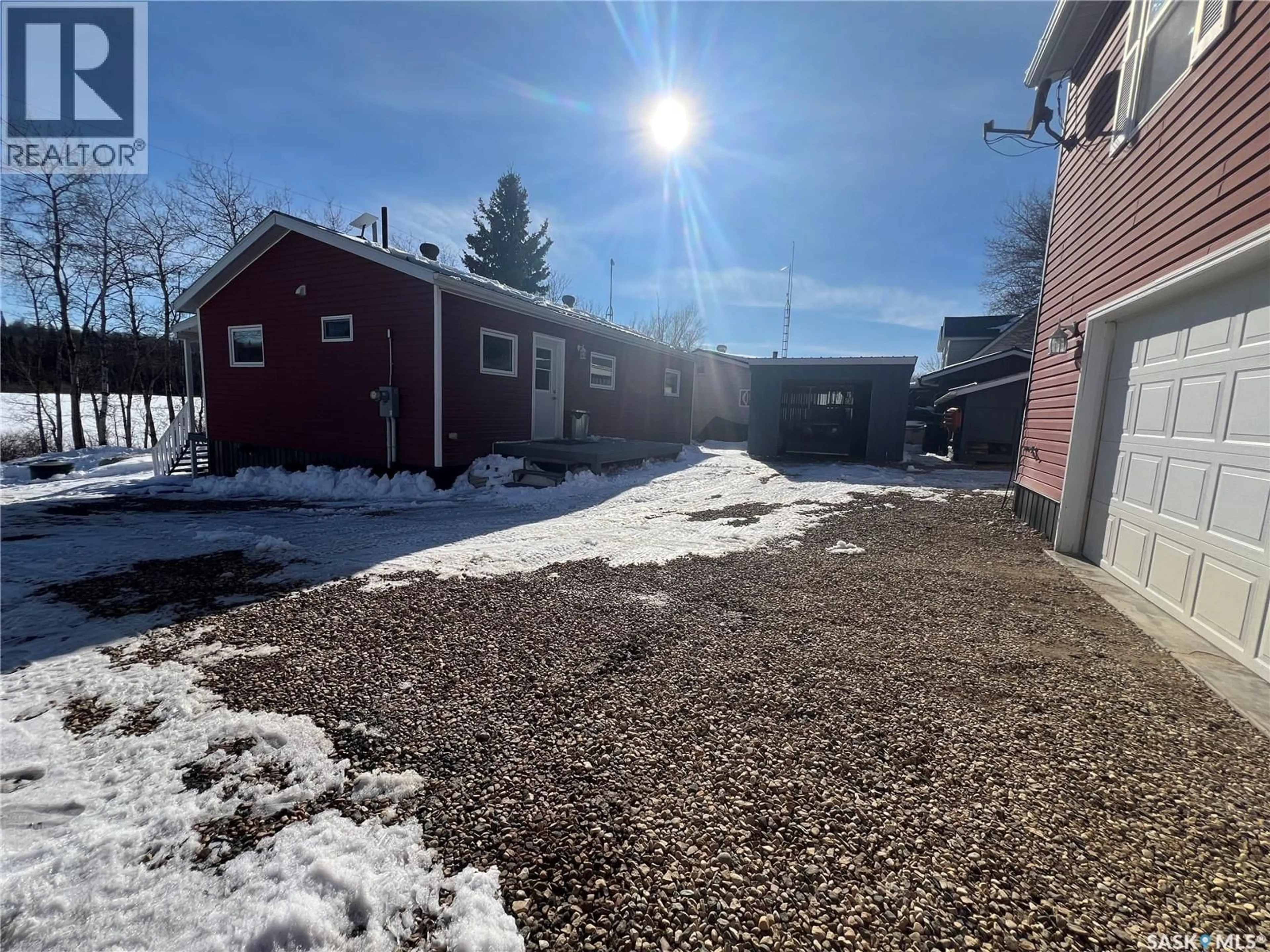A pic from outside/outdoor area/front of a property/back of a property/a pic from drone, street for 113 POPLAR CRESCENT, Hudson Bay Rm No. 394 Saskatchewan S0E0Y0