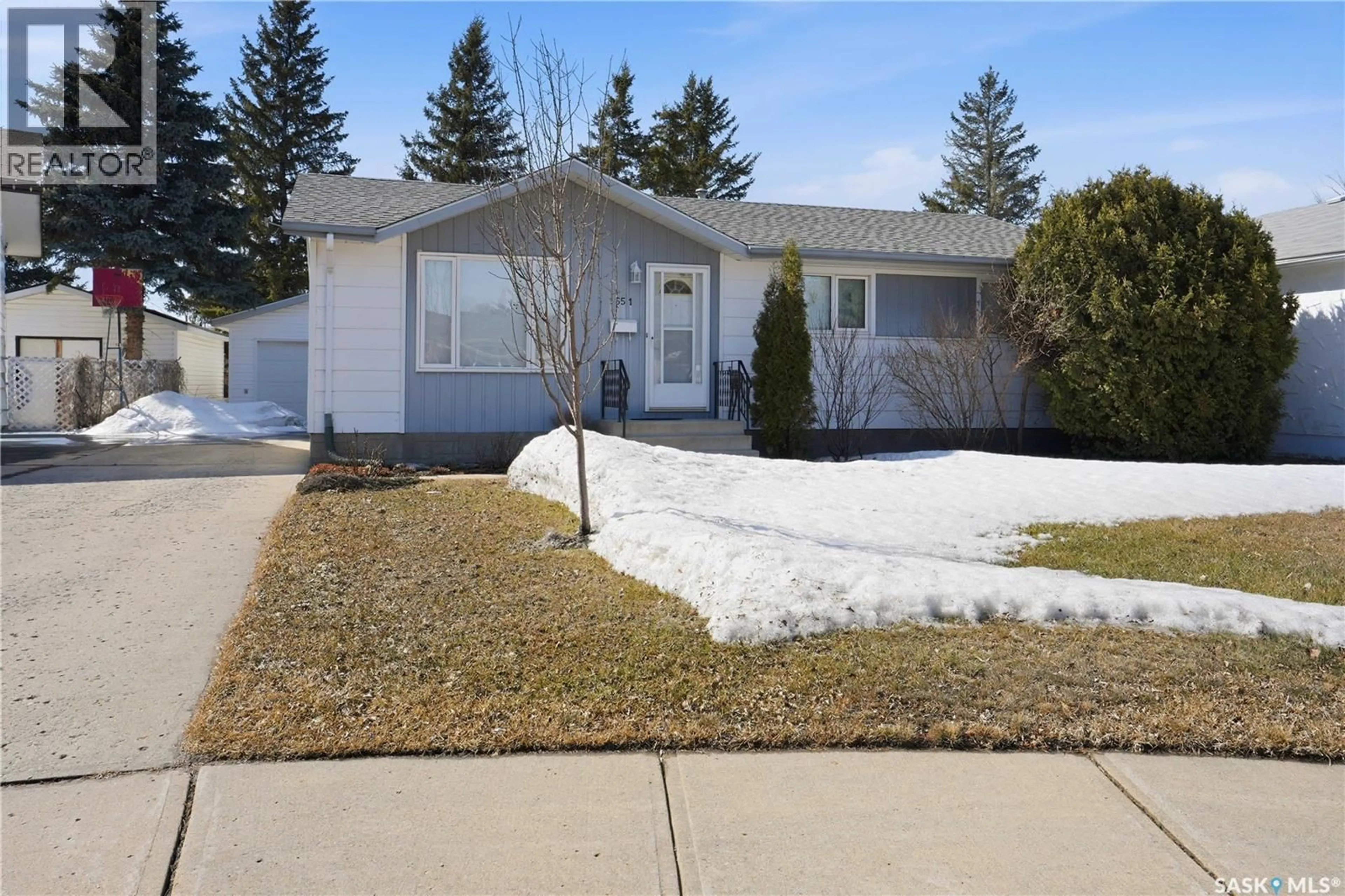 Home with vinyl exterior material, street for 1551 MACKENZIE KING CRESCENT, North Battleford Saskatchewan S9A3C5