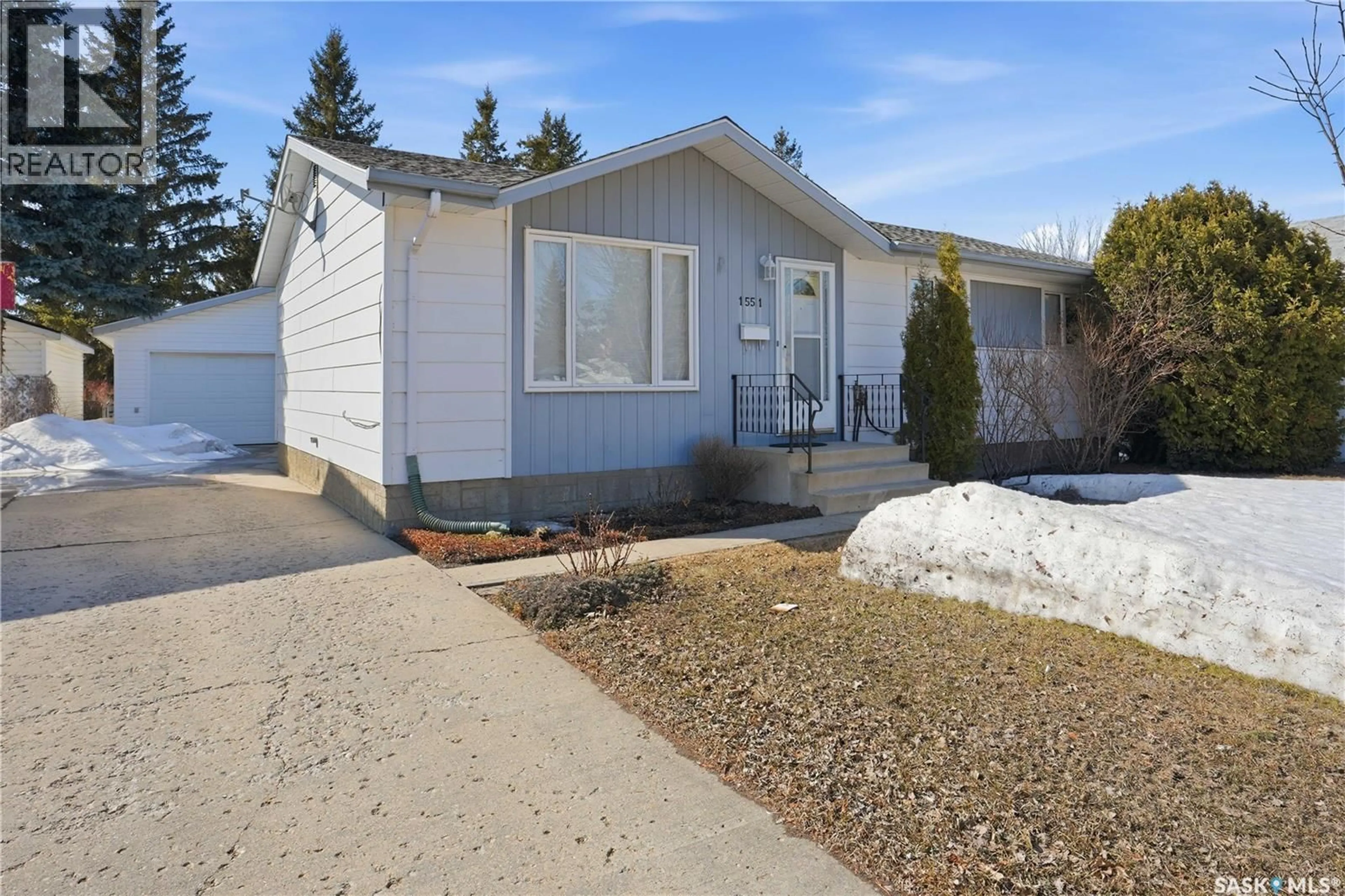 Home with vinyl exterior material, street for 1551 MACKENZIE KING CRESCENT, North Battleford Saskatchewan S9A3C5