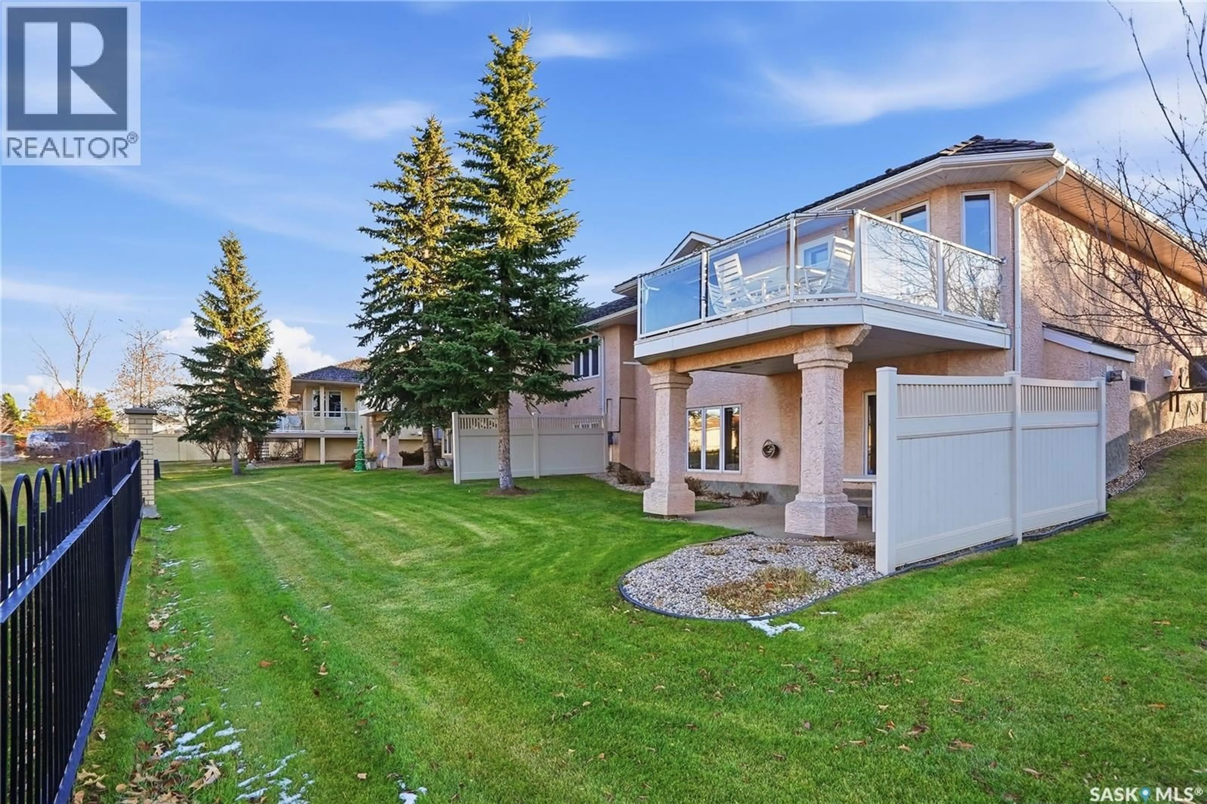 A pic from outside/outdoor area/front of a property/back of a property/a pic from drone, unknown for 4 330 STODOLA COURT, Saskatoon Saskatchewan S7N4N9