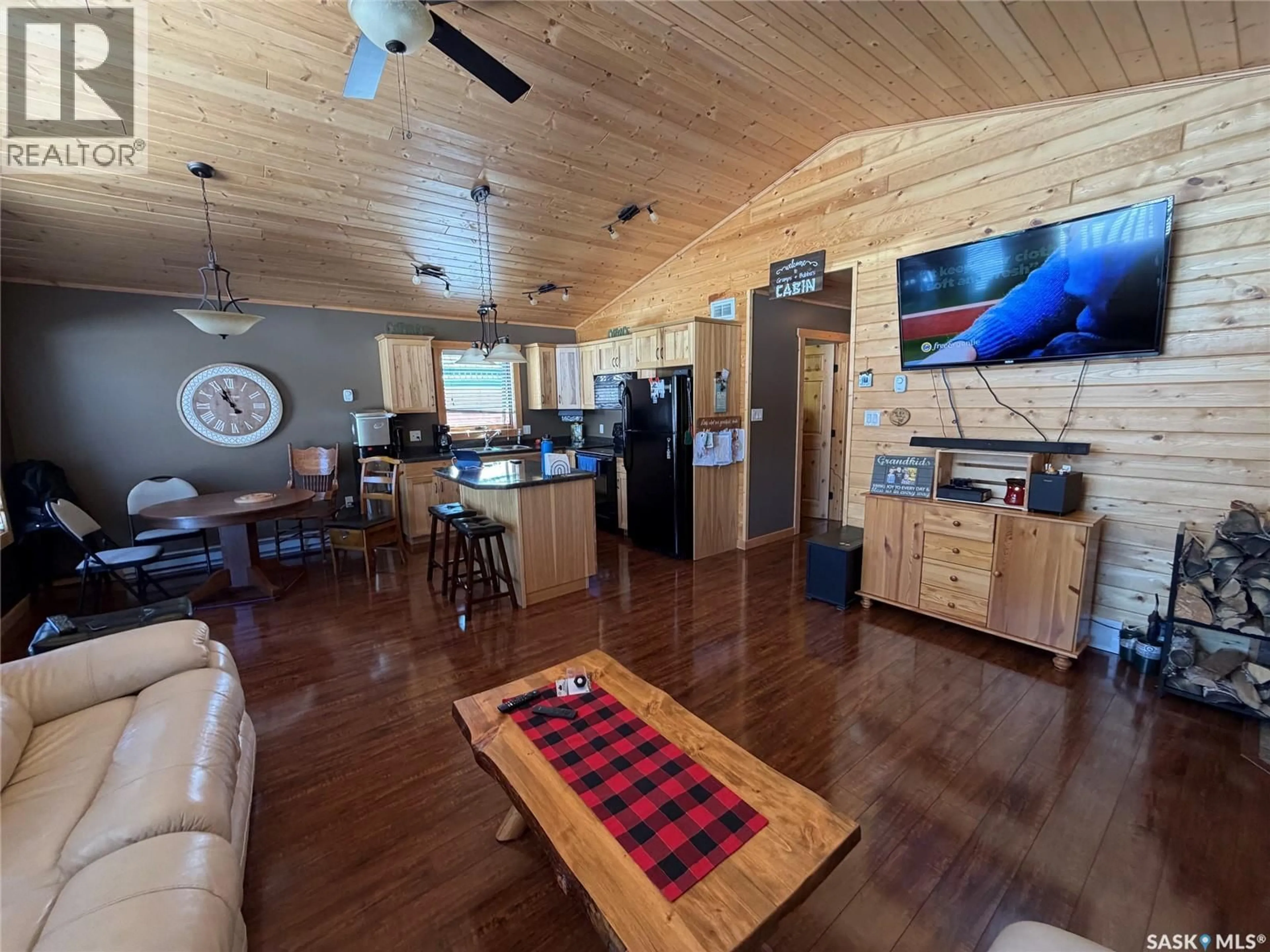 Open concept kitchen, wood/laminate floor for 106 SULLIVAN PLACE, Chitek Lake Saskatchewan S0J0L0