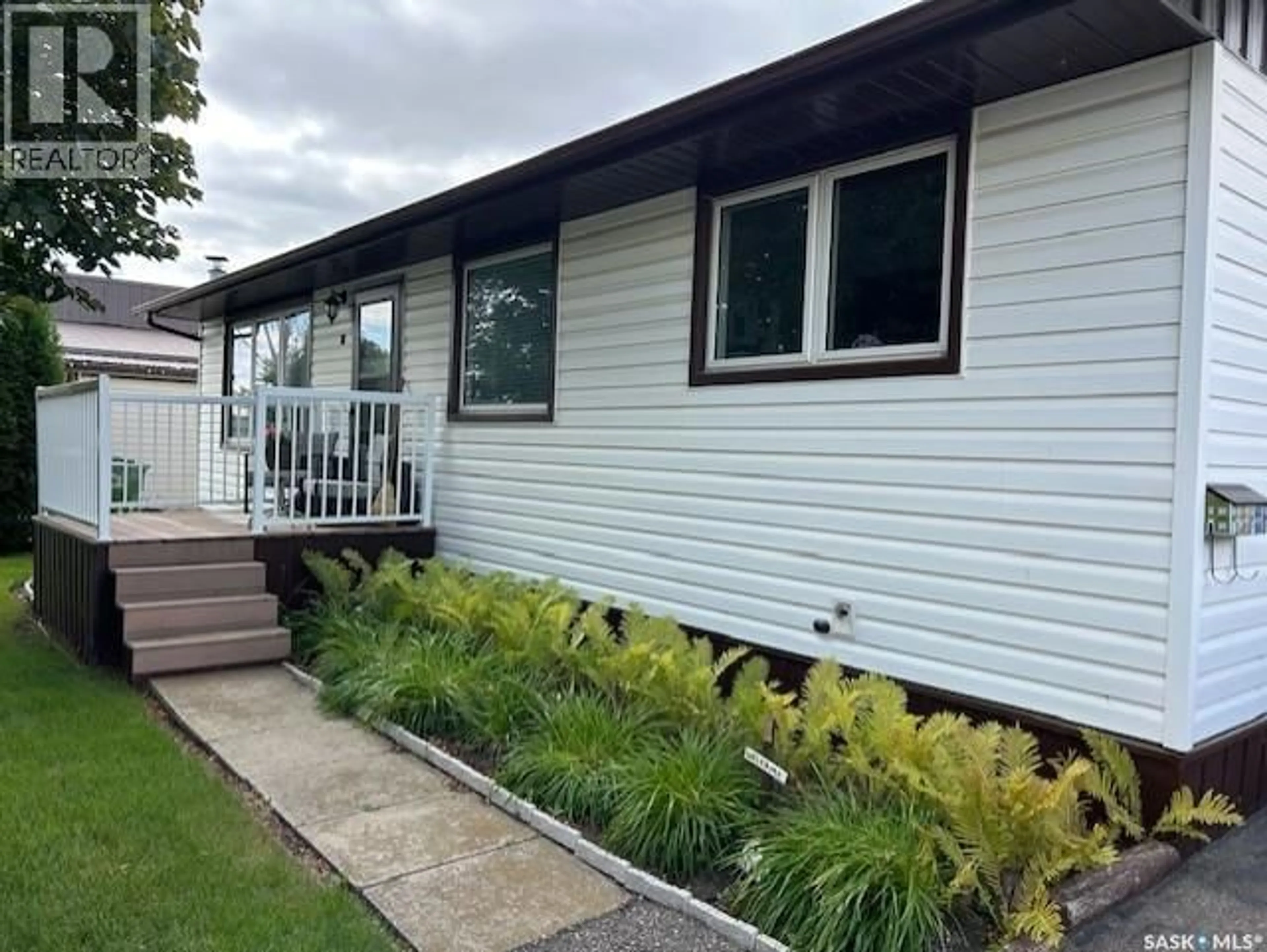 Home with vinyl exterior material, street for 18 WATERLOO ROAD, Yorkton Saskatchewan S3N3E8