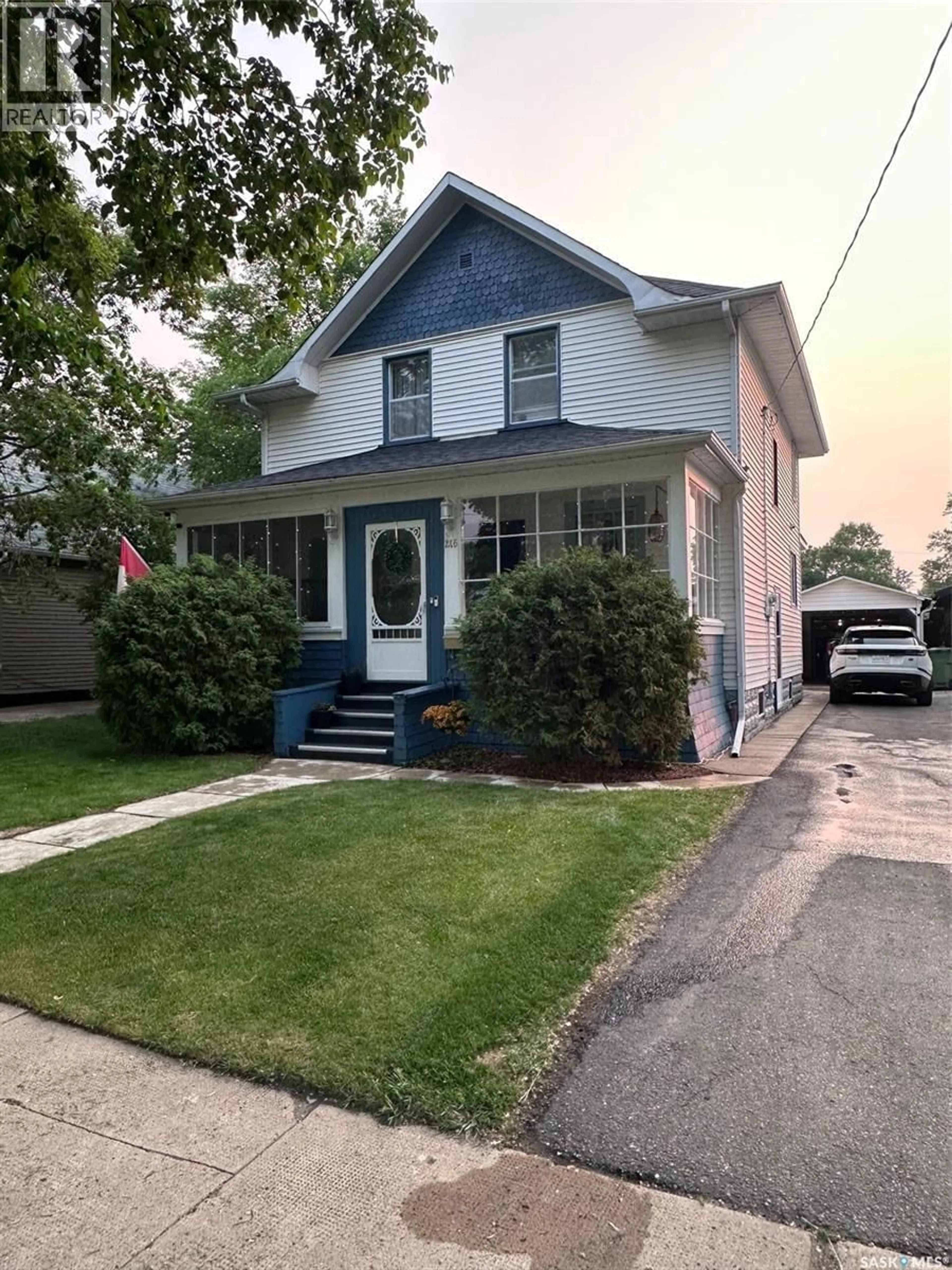 Home with vinyl exterior material, street for 216 SECOND AVENUE, Yorkton Saskatchewan S3N1G7