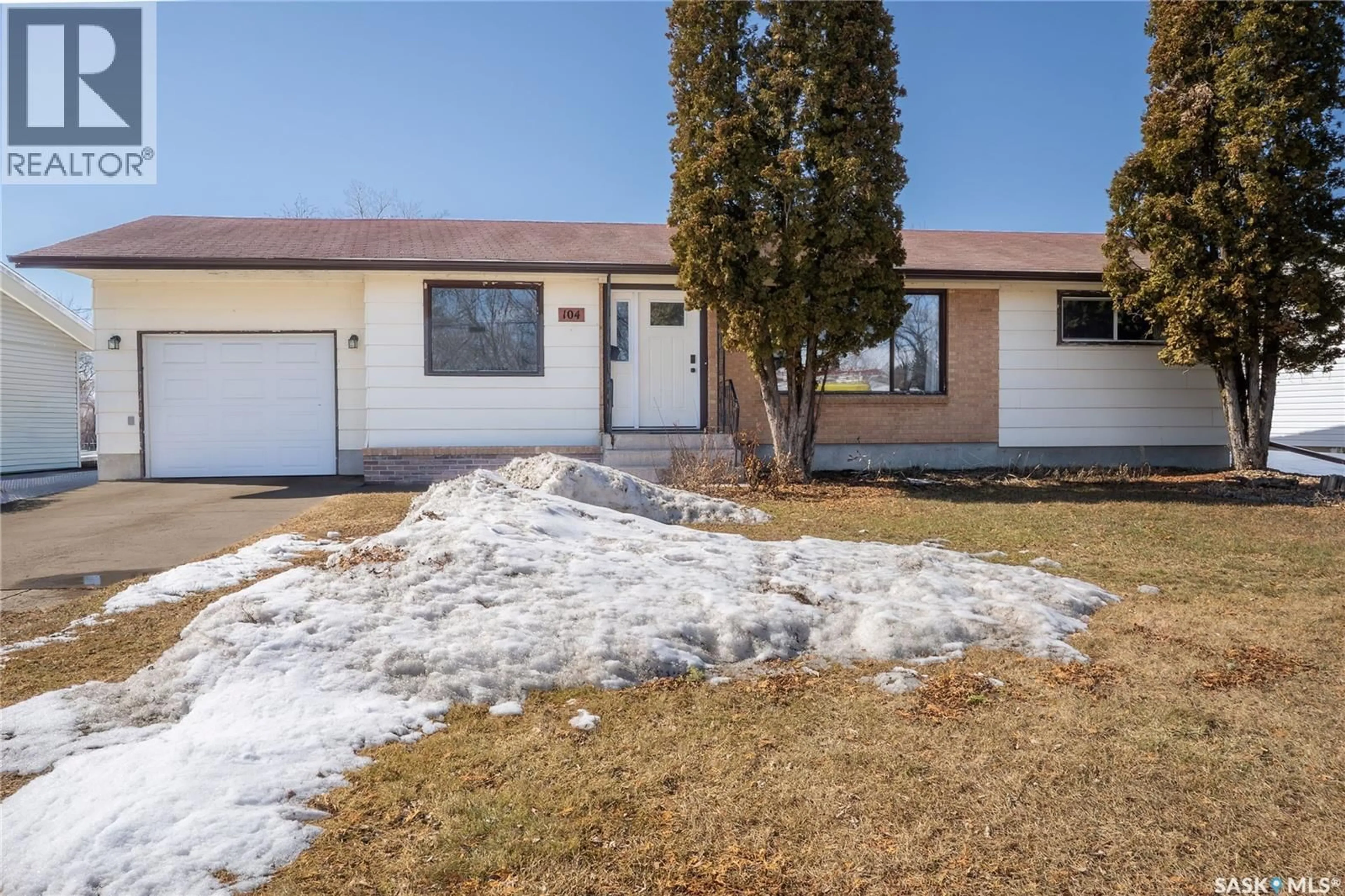Home with vinyl exterior material, street for 104 2ND AVENUE, Rosthern Saskatchewan S0K3R0