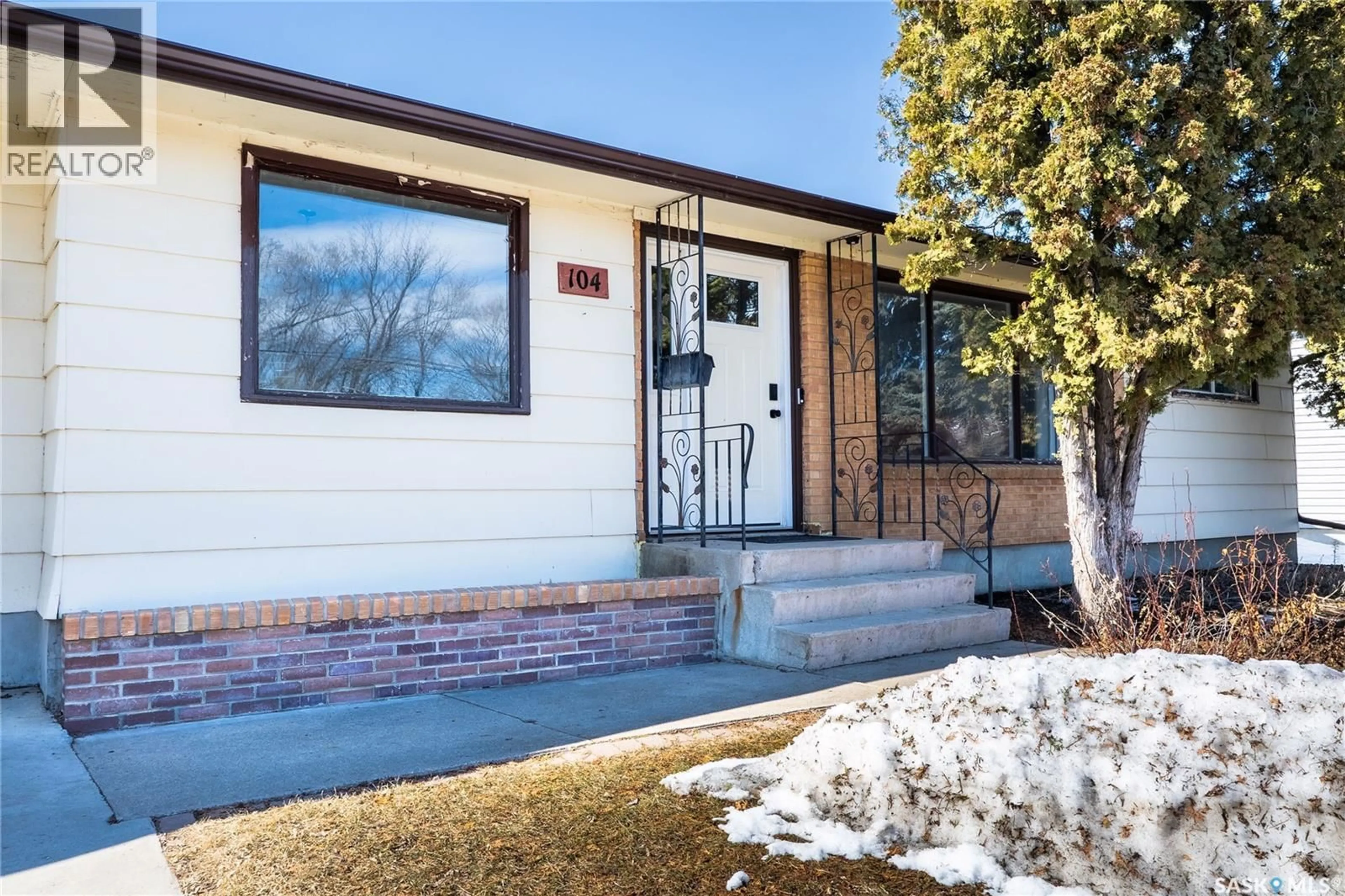 Home with brick exterior material, street for 104 2ND AVENUE, Rosthern Saskatchewan S0K3R0