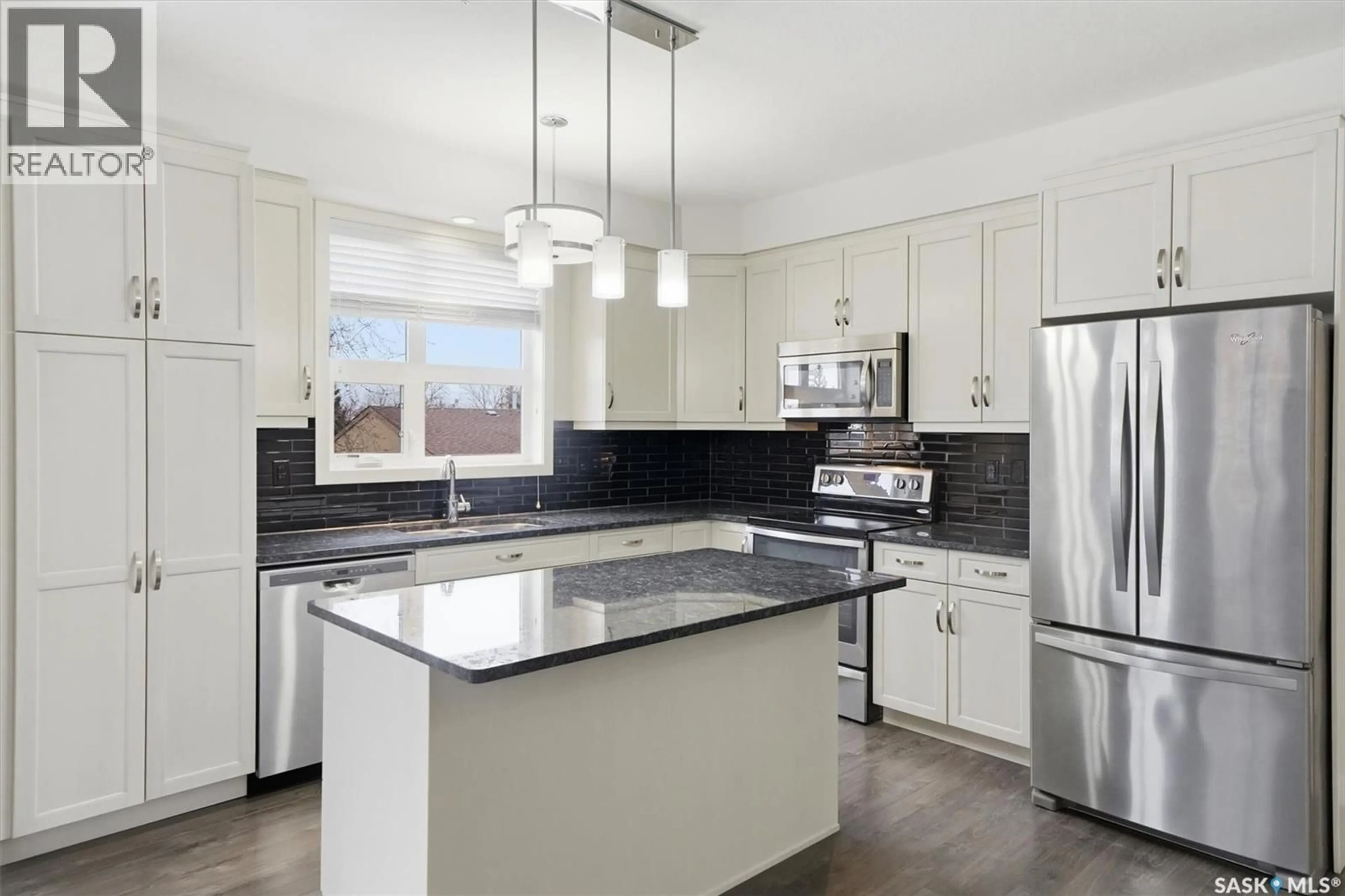 Open concept kitchen, ceramic/tile floor for 206 - 1025 MOSS AVENUE, Saskatoon Saskatchewan S7H4C7
