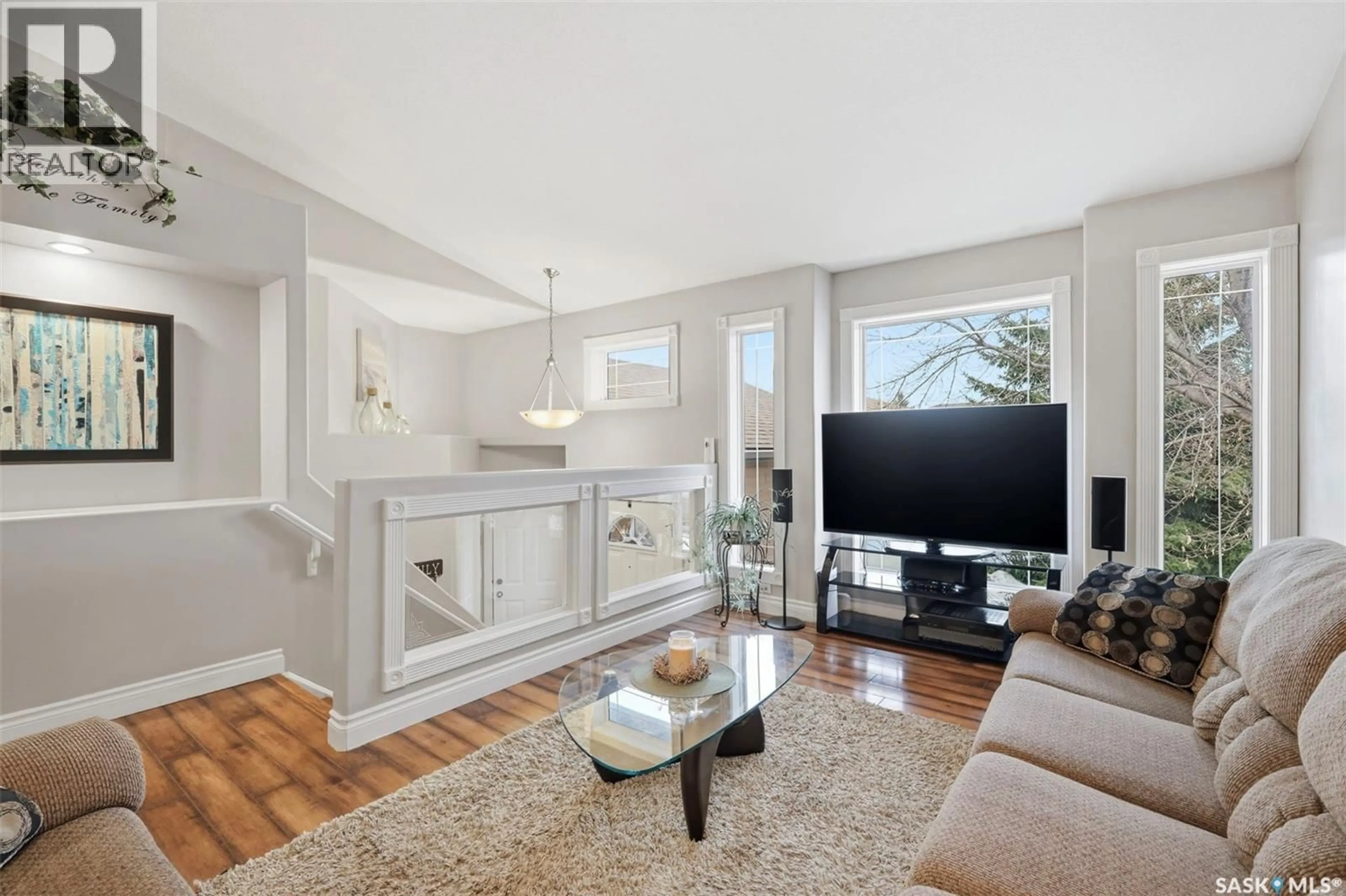 Living room with furniture, unknown for 402 OVERHOLT CRESCENT, Saskatoon Saskatchewan S7N4S9