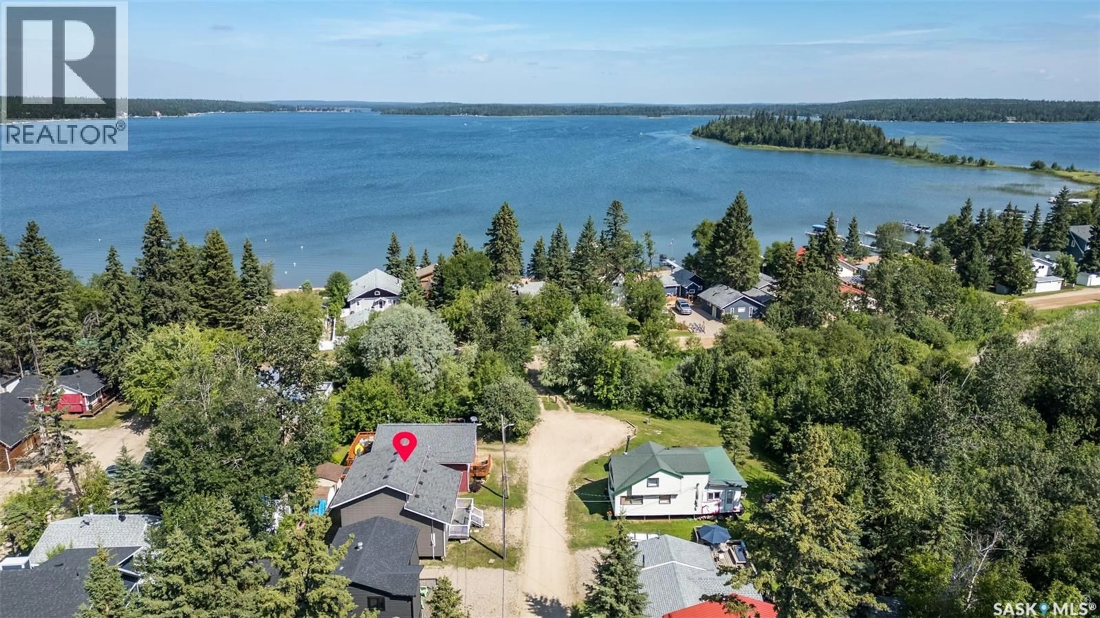 A pic from outside/outdoor area/front of a property/back of a property/a pic from drone, water/lake/river/ocean view for 3 8TH STREET, Lakeland Rm No. 521 Saskatchewan S0J0N0