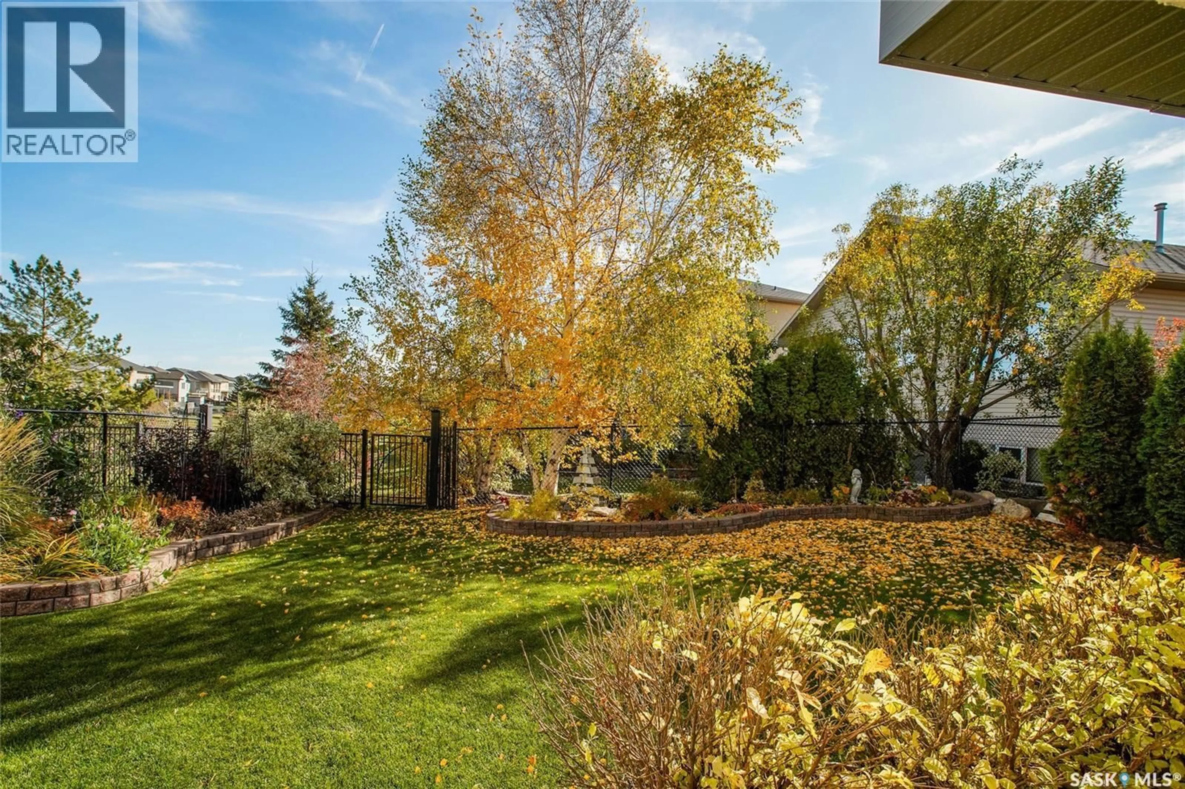 Patio, forest/trees view for 511 GREAVES LANE, Saskatoon Saskatchewan S7W1A9