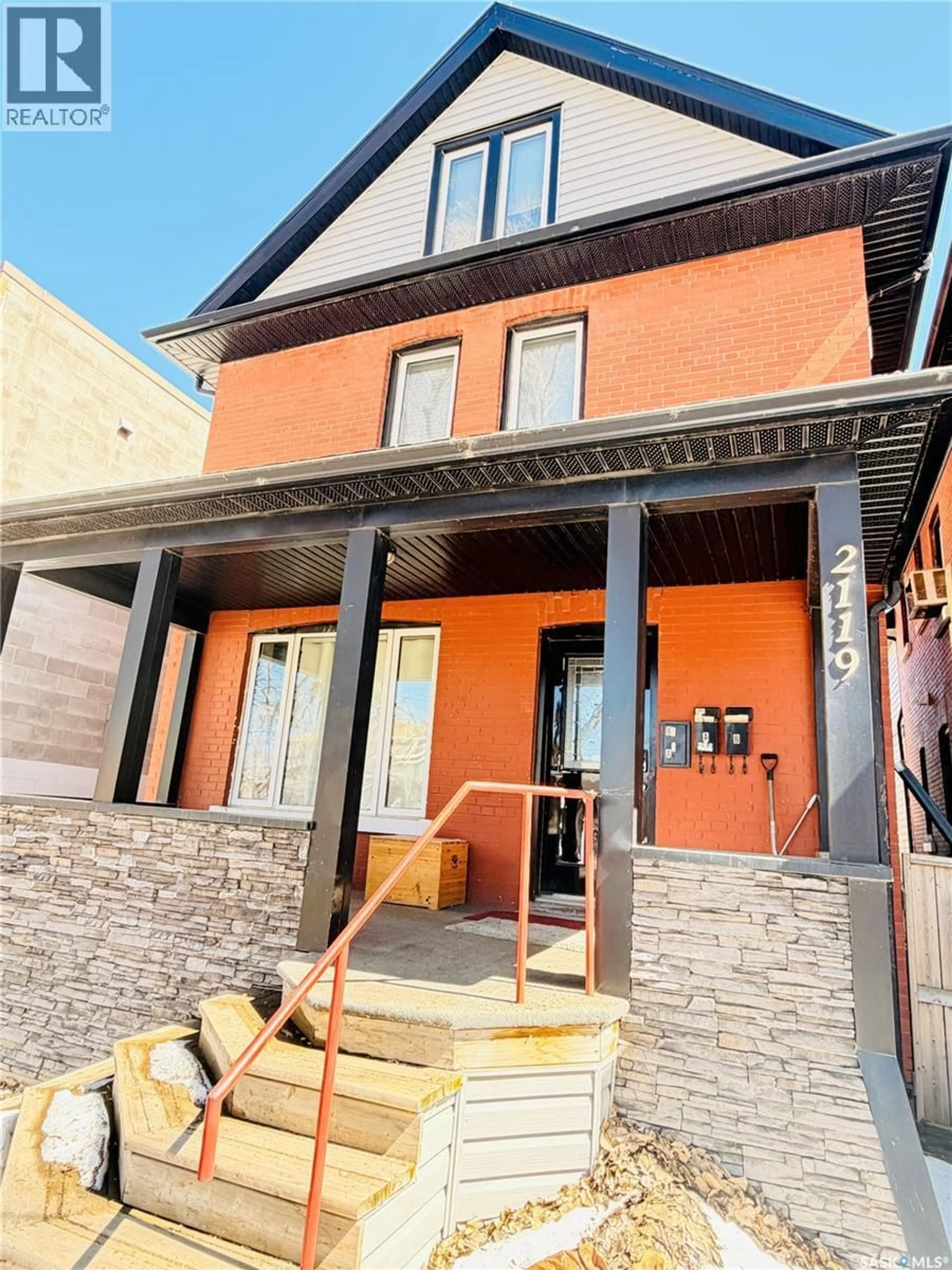 Home with brick exterior material, street for 2119 LORNE STREET, Regina Saskatchewan S4P2M6