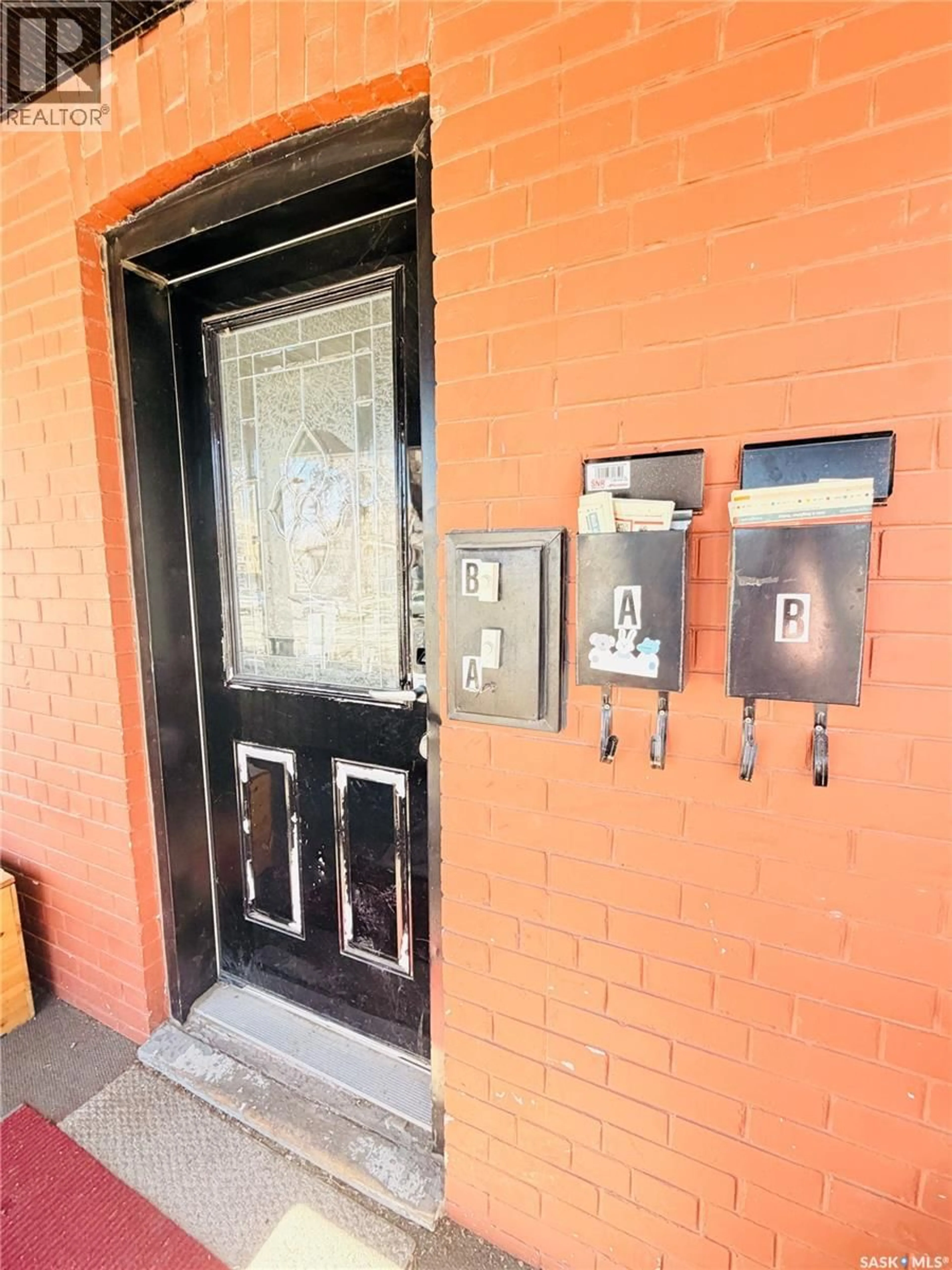 Indoor foyer for 2119 LORNE STREET, Regina Saskatchewan S4P2M6