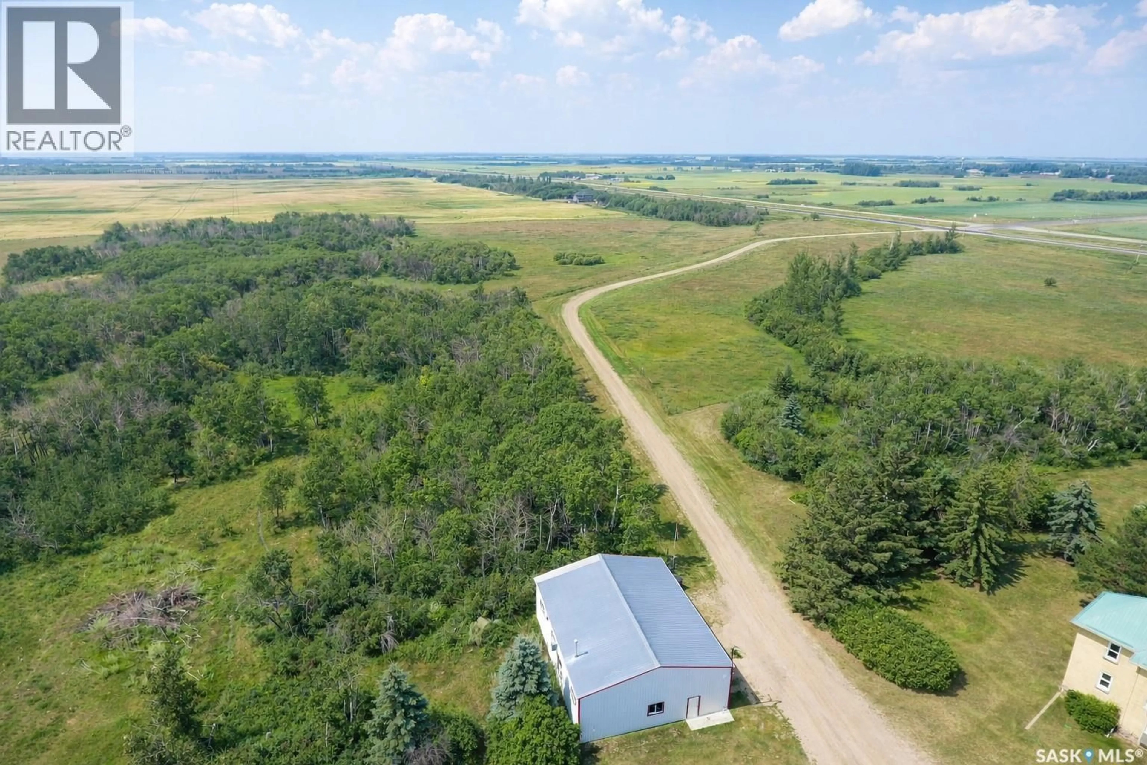 A pic from outside/outdoor area/front of a property/back of a property/a pic from drone, water/lake/river/ocean view for THORSON PROPERTY, South Qu'Appelle Rm No. 157 Saskatchewan S0G4A0