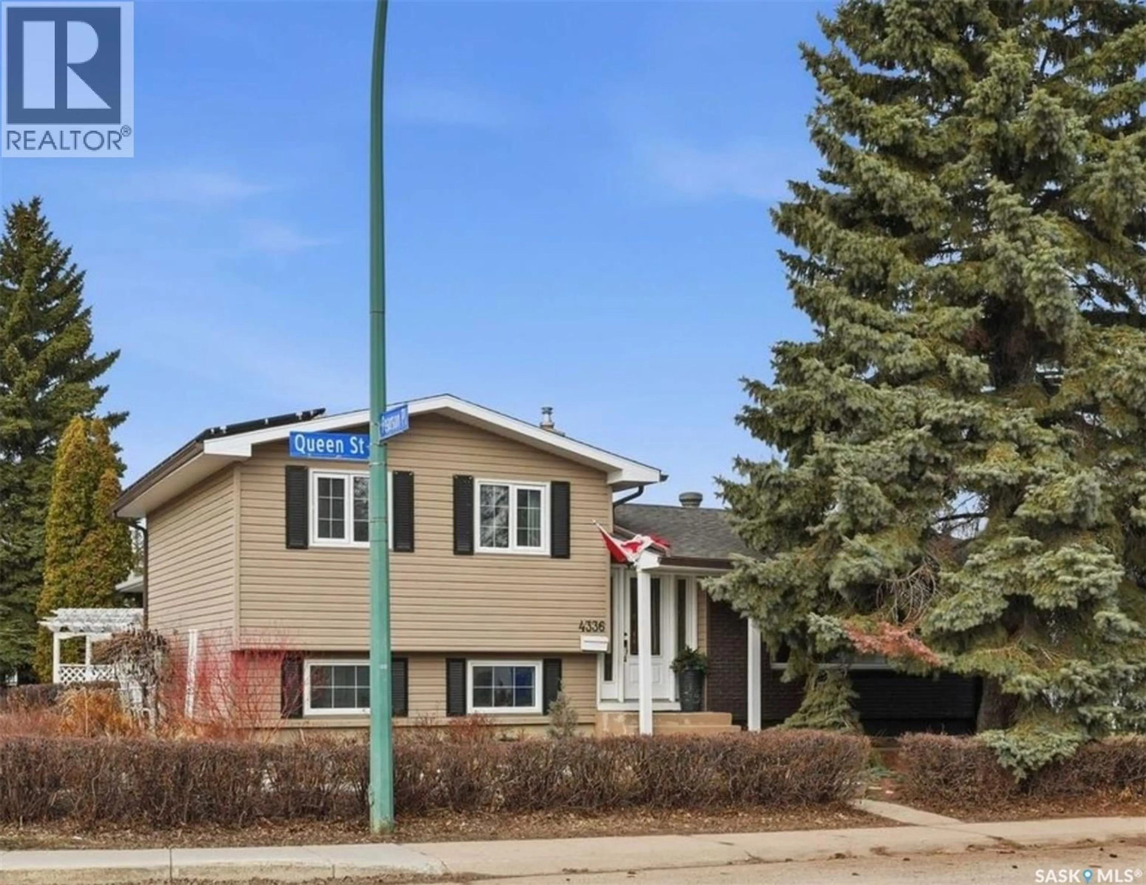 Home with vinyl exterior material, street for 4336 QUEEN STREET, Regina Saskatchewan S4S5V9