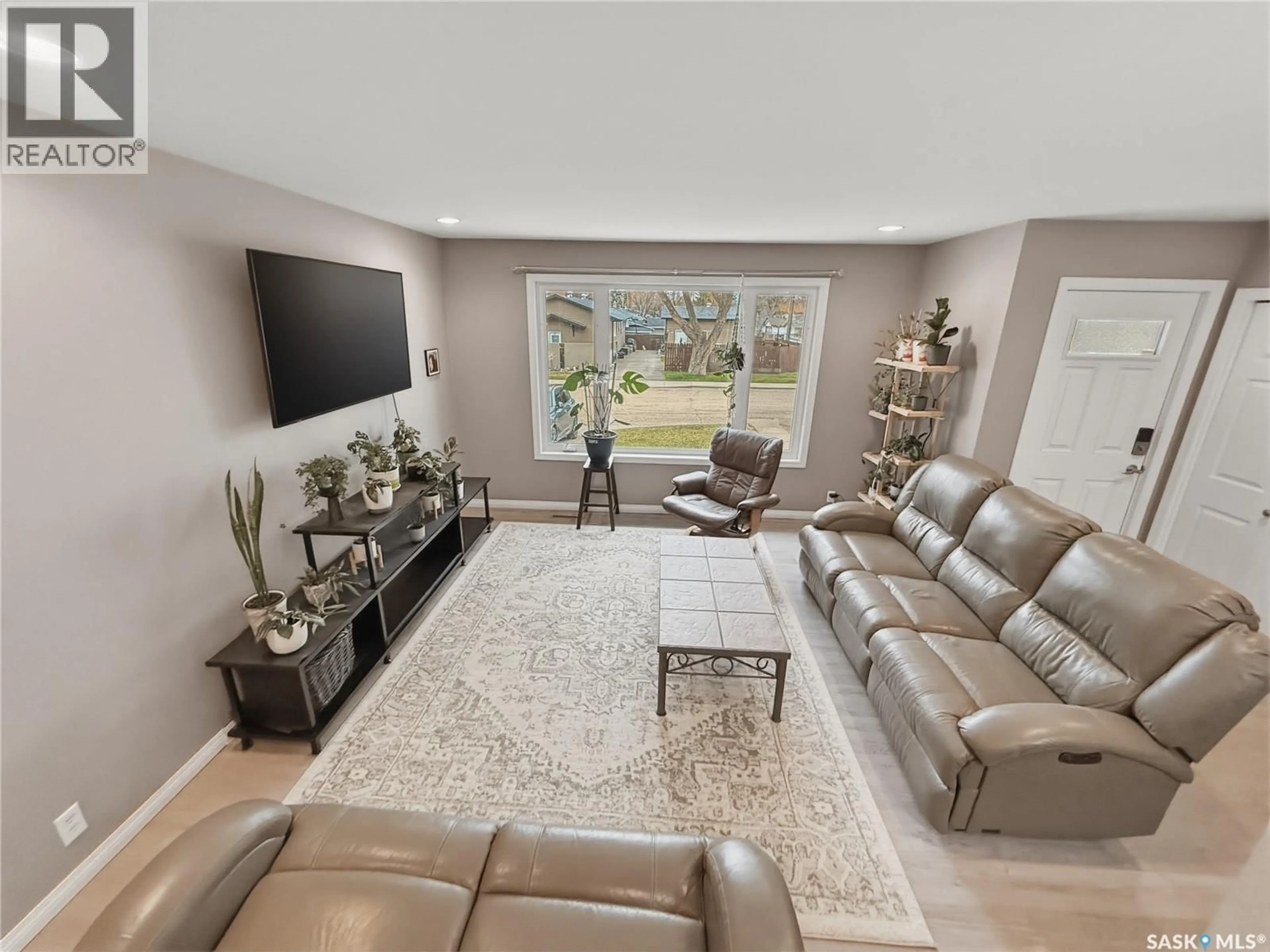 Living room with furniture, unknown for 488 3RD AVENUE, Swift Current Saskatchewan S9H3K8