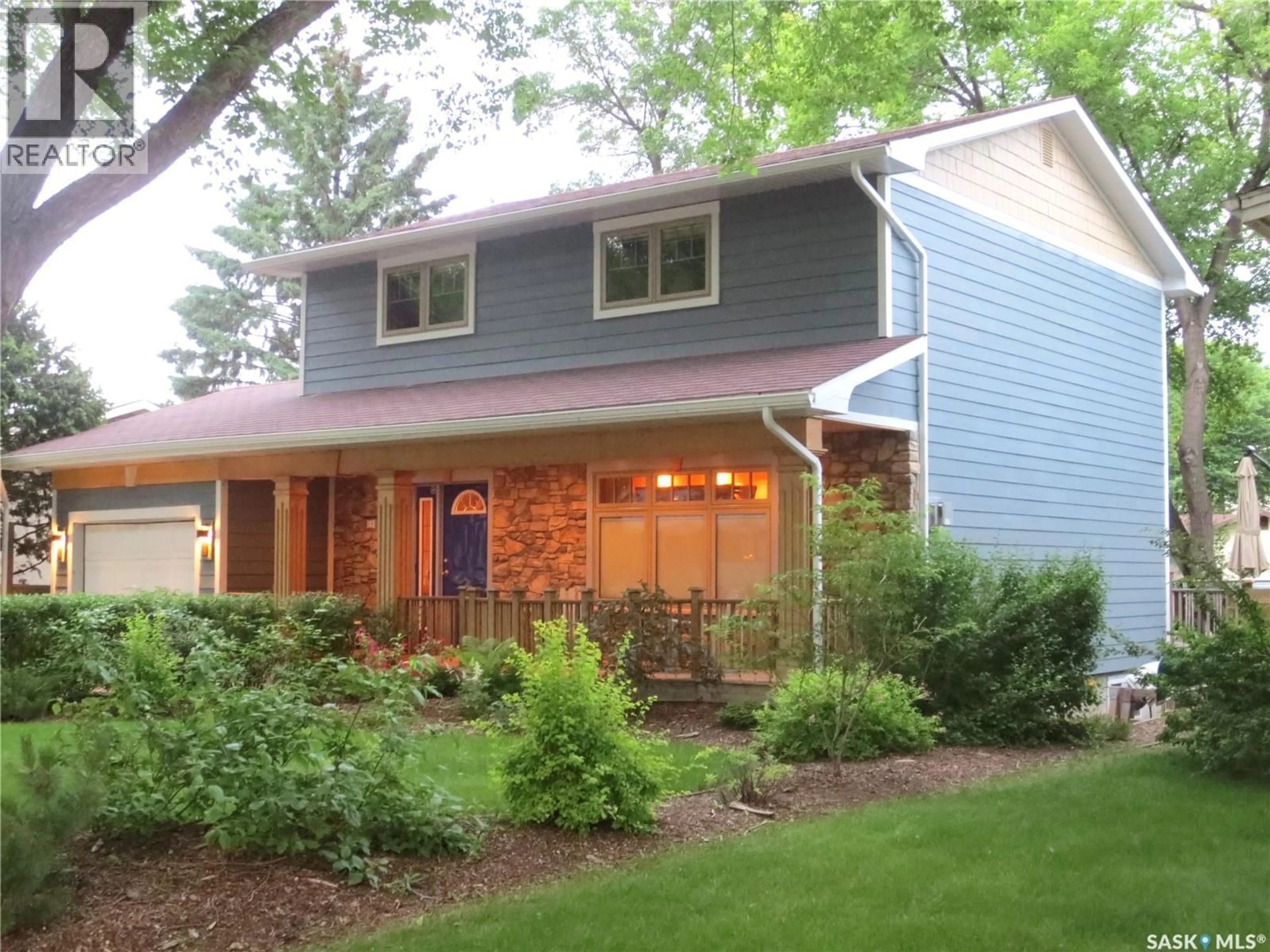 Home with vinyl exterior material, street for 18 RUPERT DRIVE, Saskatoon Saskatchewan S7K1B2