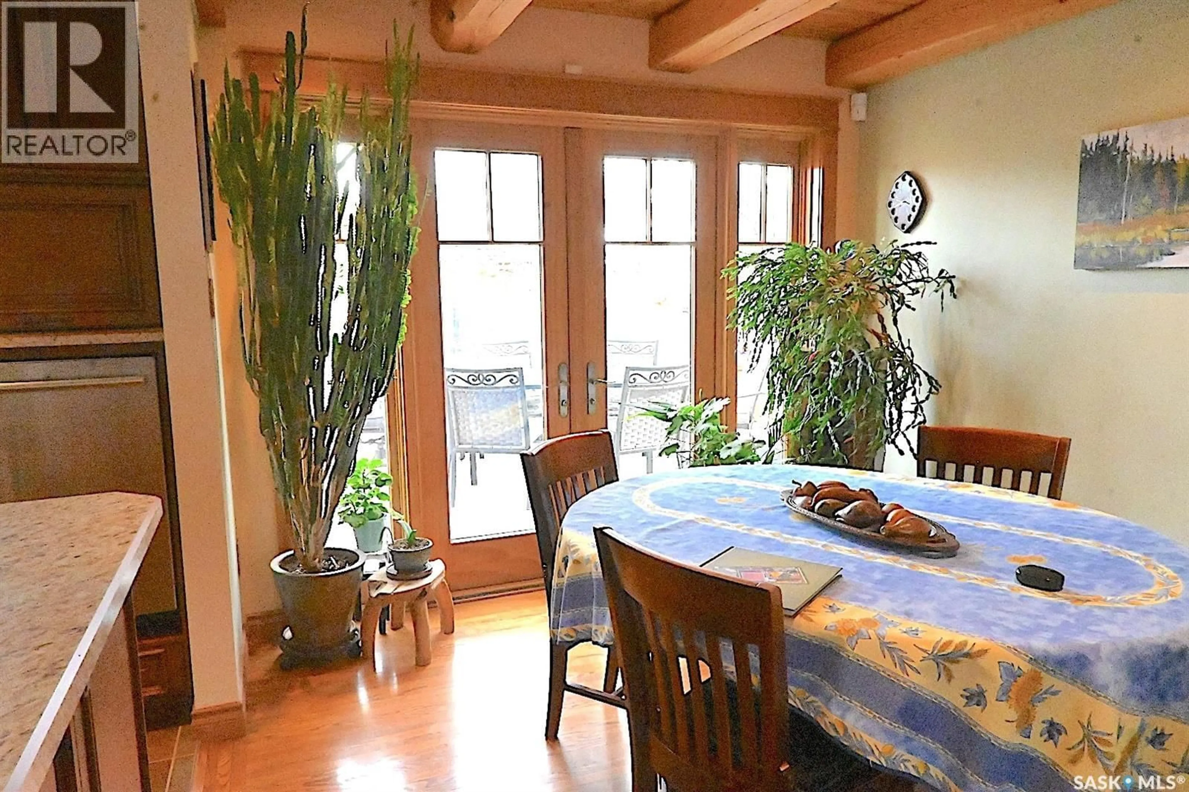 Dining room, wood/laminate floor for 18 RUPERT DRIVE, Saskatoon Saskatchewan S7K1B2