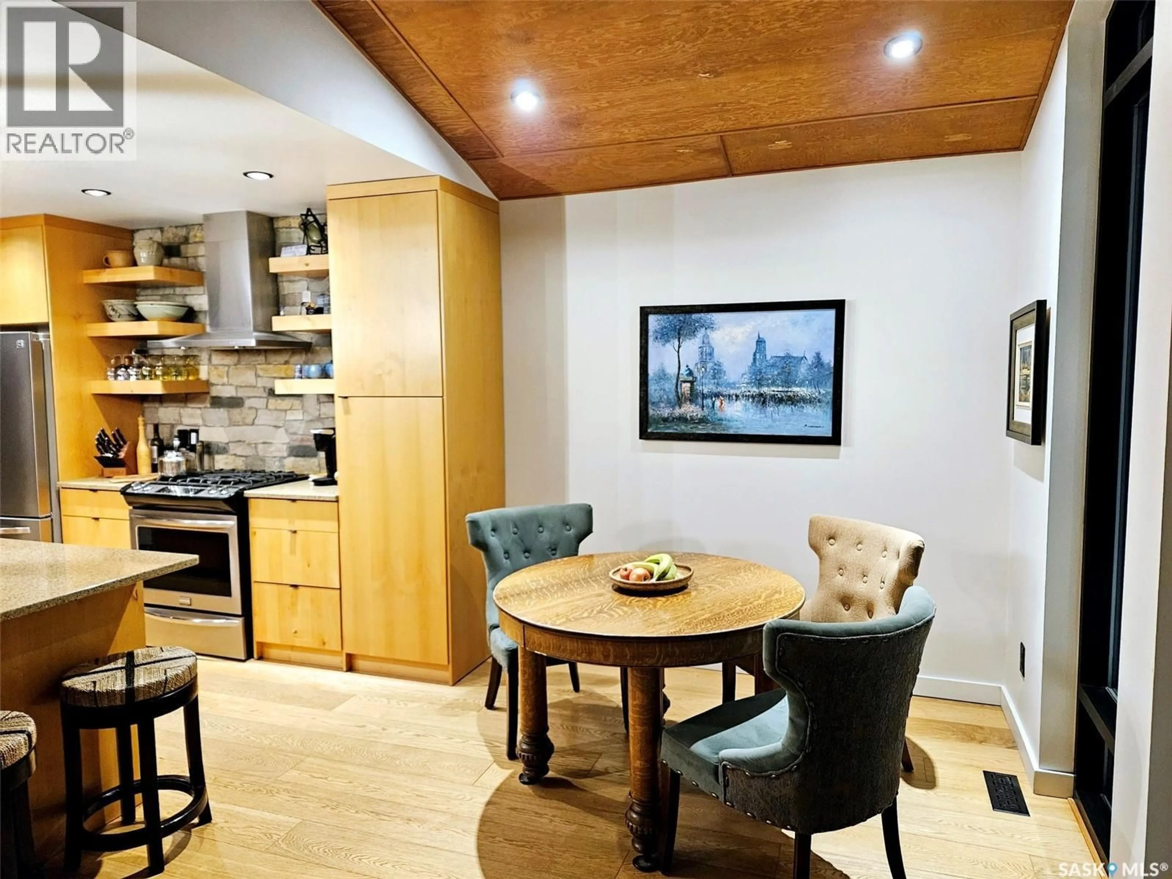 Open concept kitchen, wood/laminate floor for 14 COCAPA AVENUE, Kenosee Lake Saskatchewan S0C0S0