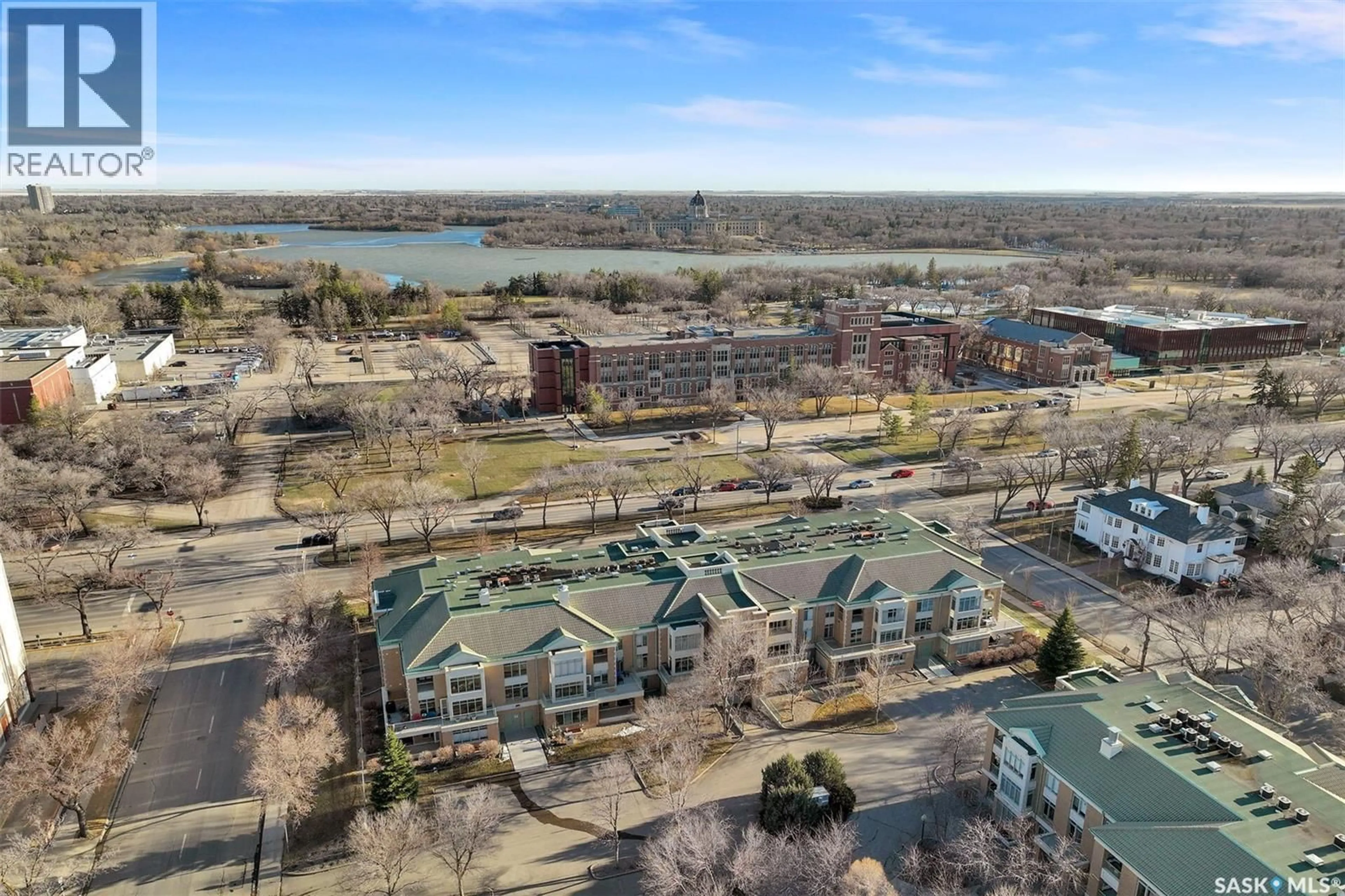 A pic from outside/outdoor area/front of a property/back of a property/a pic from drone, water/lake/river/ocean view for 310 2050 COLLEGE AVENUE, Regina Saskatchewan S4P4M3