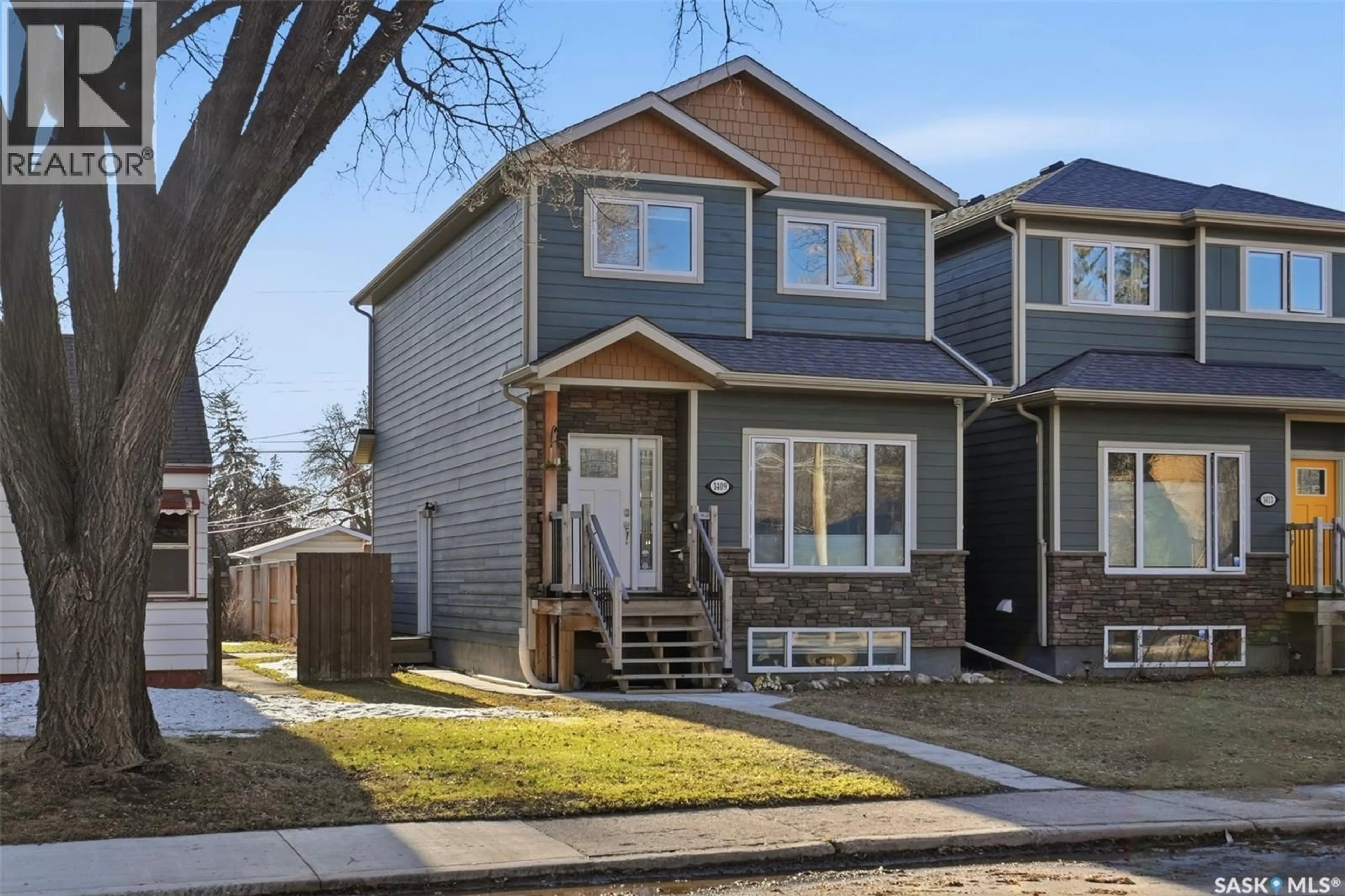 Home with brick exterior material, street for 1409 2ND AVENUE, Saskatoon Saskatchewan S7K2E7