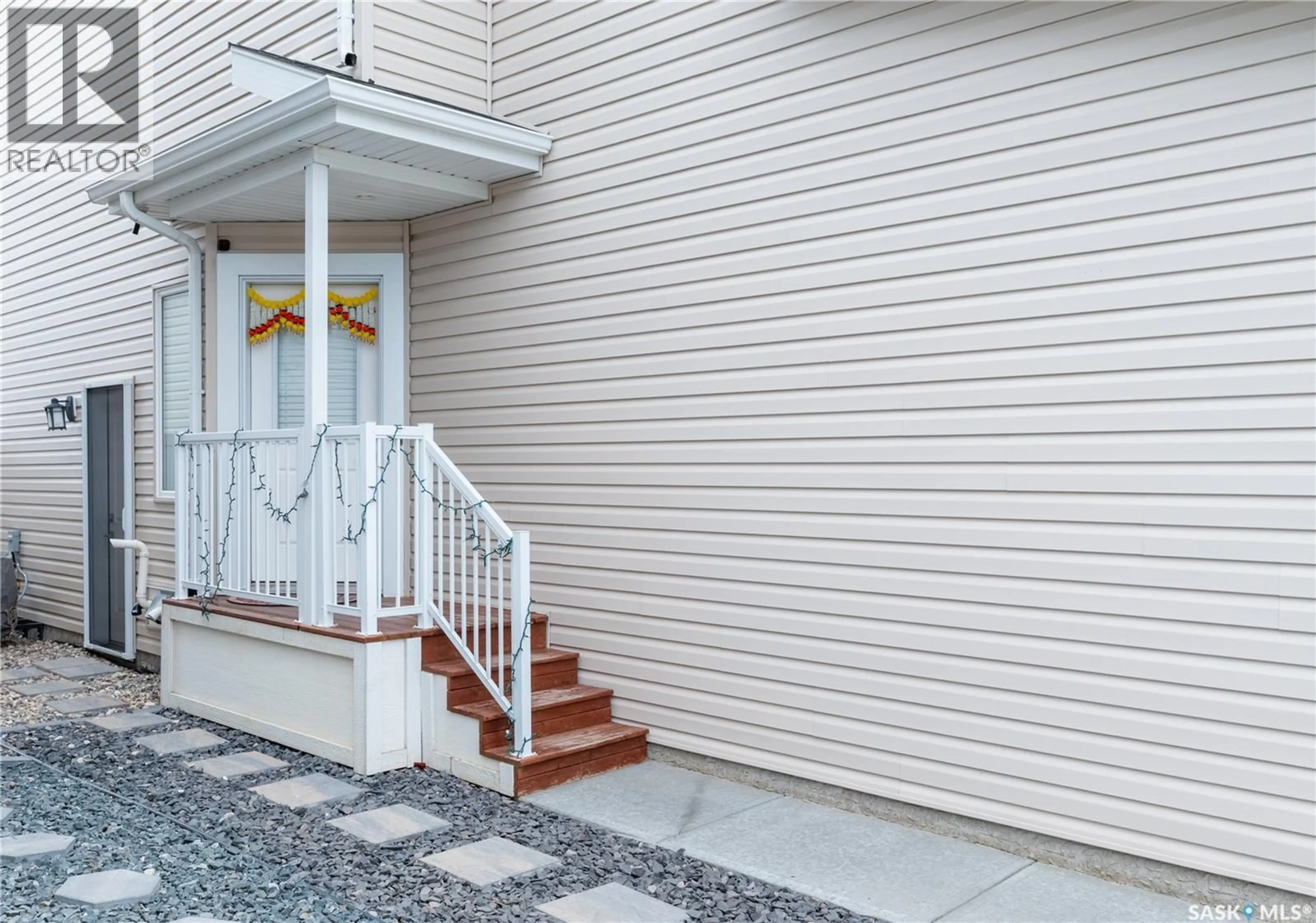 Home with vinyl exterior material, street for 3257 GREEN STONE ROAD, Regina Saskatchewan S4V3R4