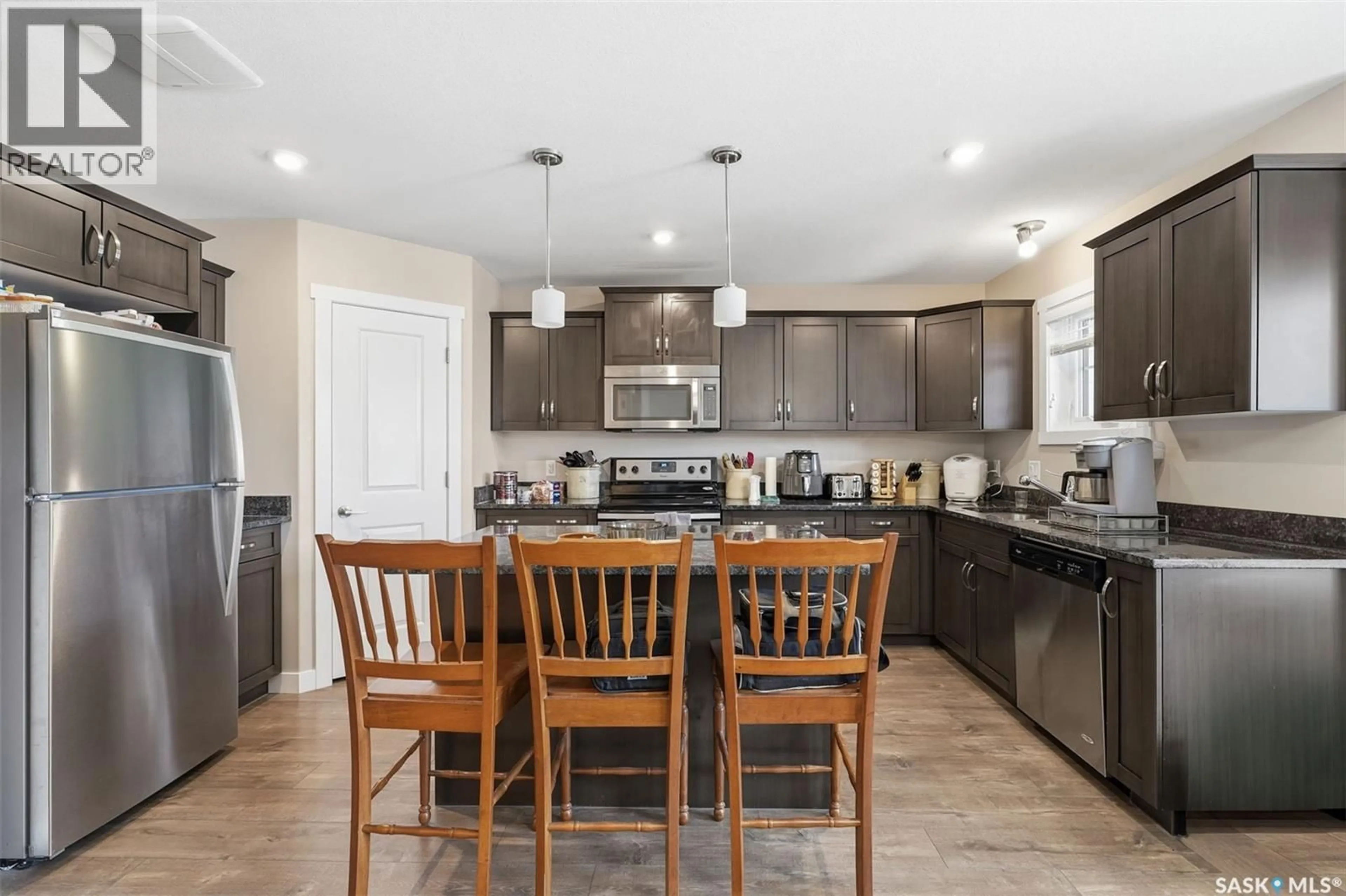Open concept kitchen, ceramic/tile floor for 556 PRINGLE CRESCENT, Saskatoon Saskatchewan S7T1C9