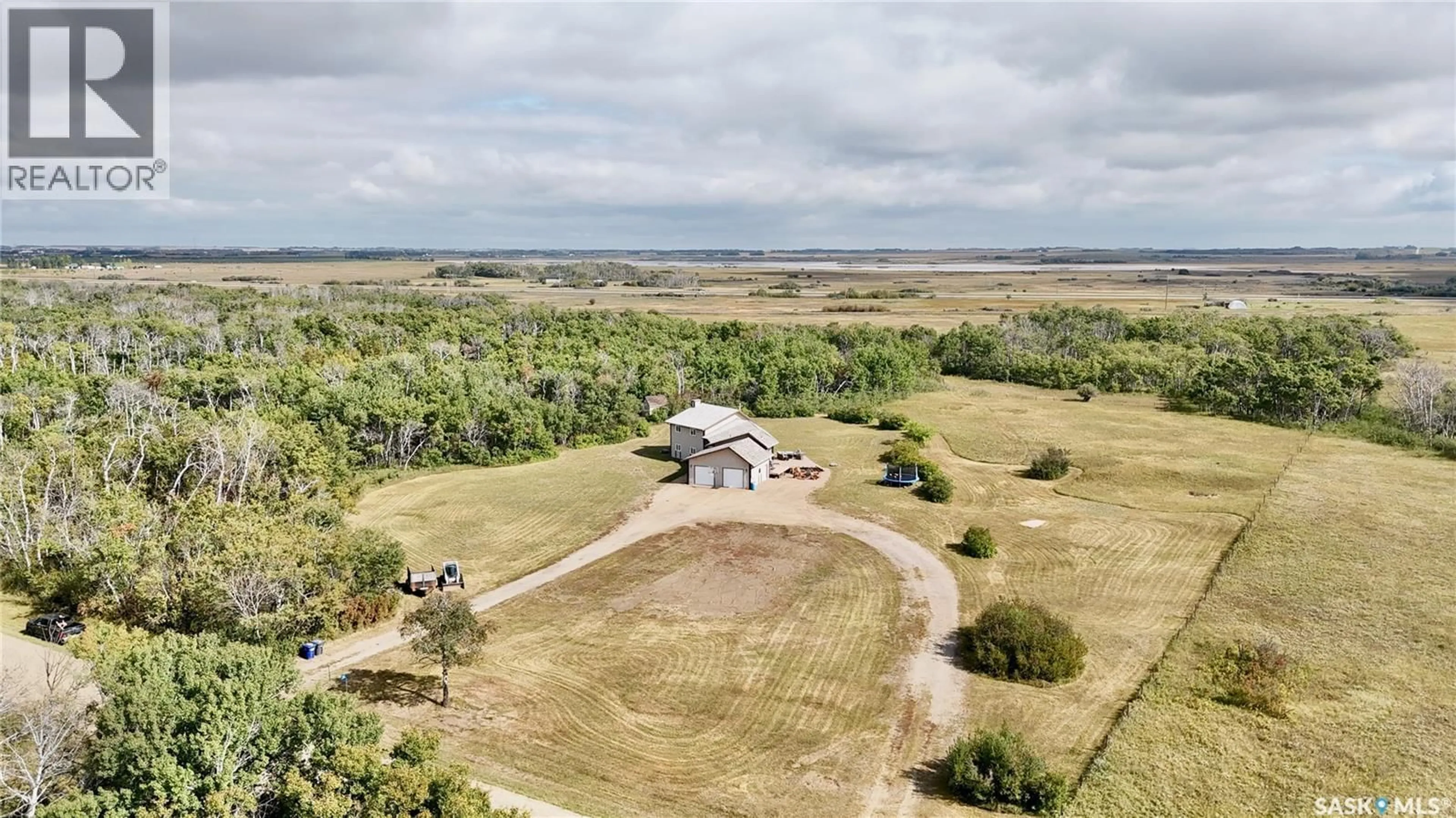 A pic from outside/outdoor area/front of a property/back of a property/a pic from drone, water/lake/river/ocean view for 393 PRYOR ROAD, Dundurn Rm No. 314 Saskatchewan S7K3J8