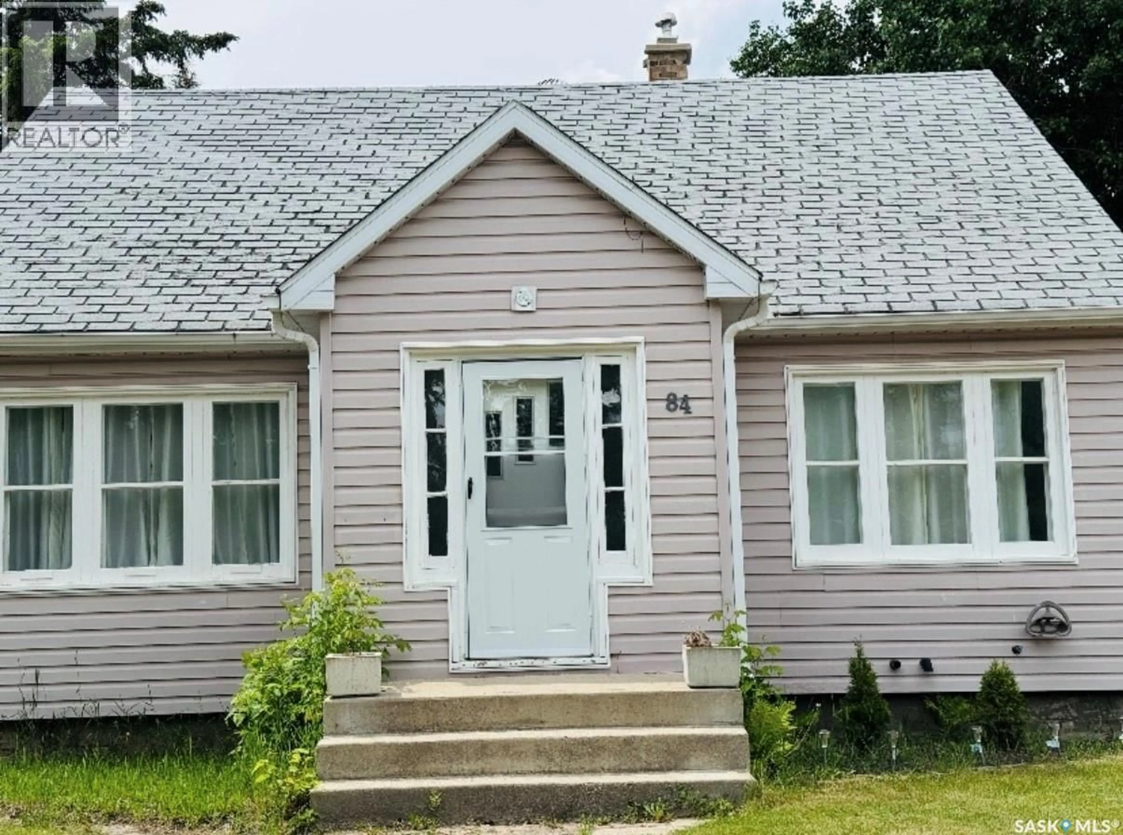 Home with vinyl exterior material, street for 84 GLADSTONE AVENUE, Yorkton Saskatchewan S3N3B3