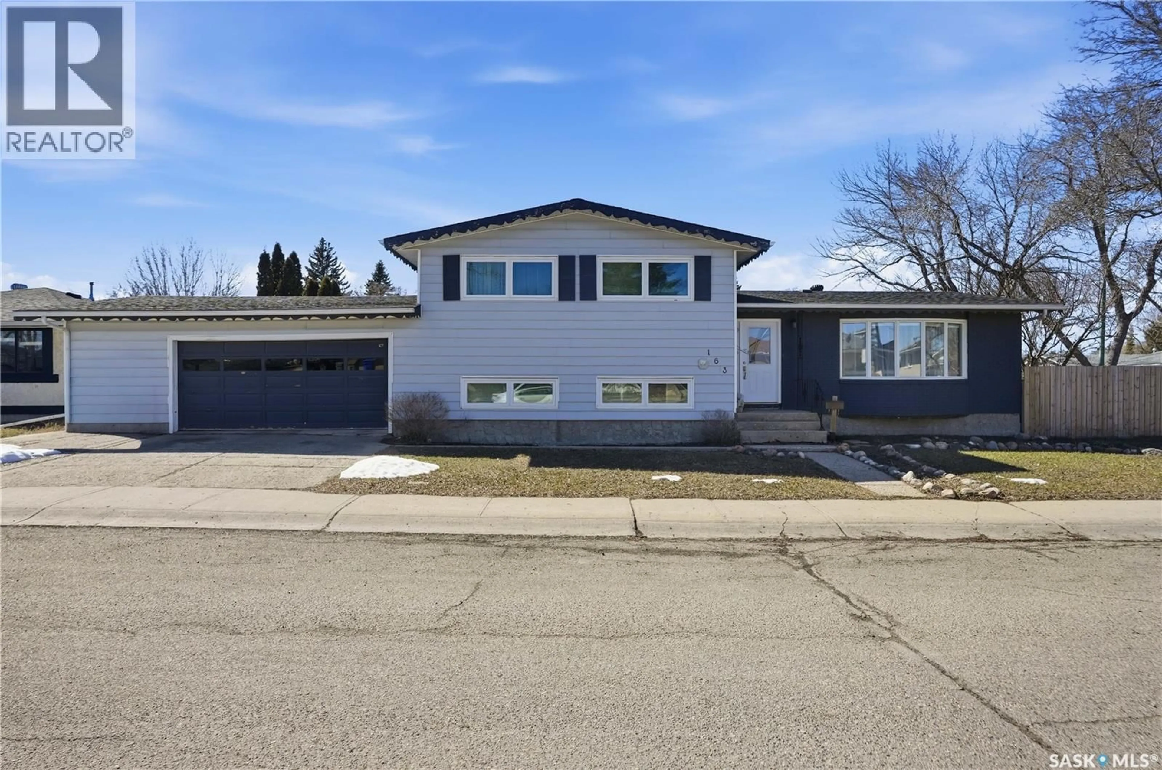 Home with vinyl exterior material, street for 163 LLOYD CRESCENT, Regina Saskatchewan S4R6B9
