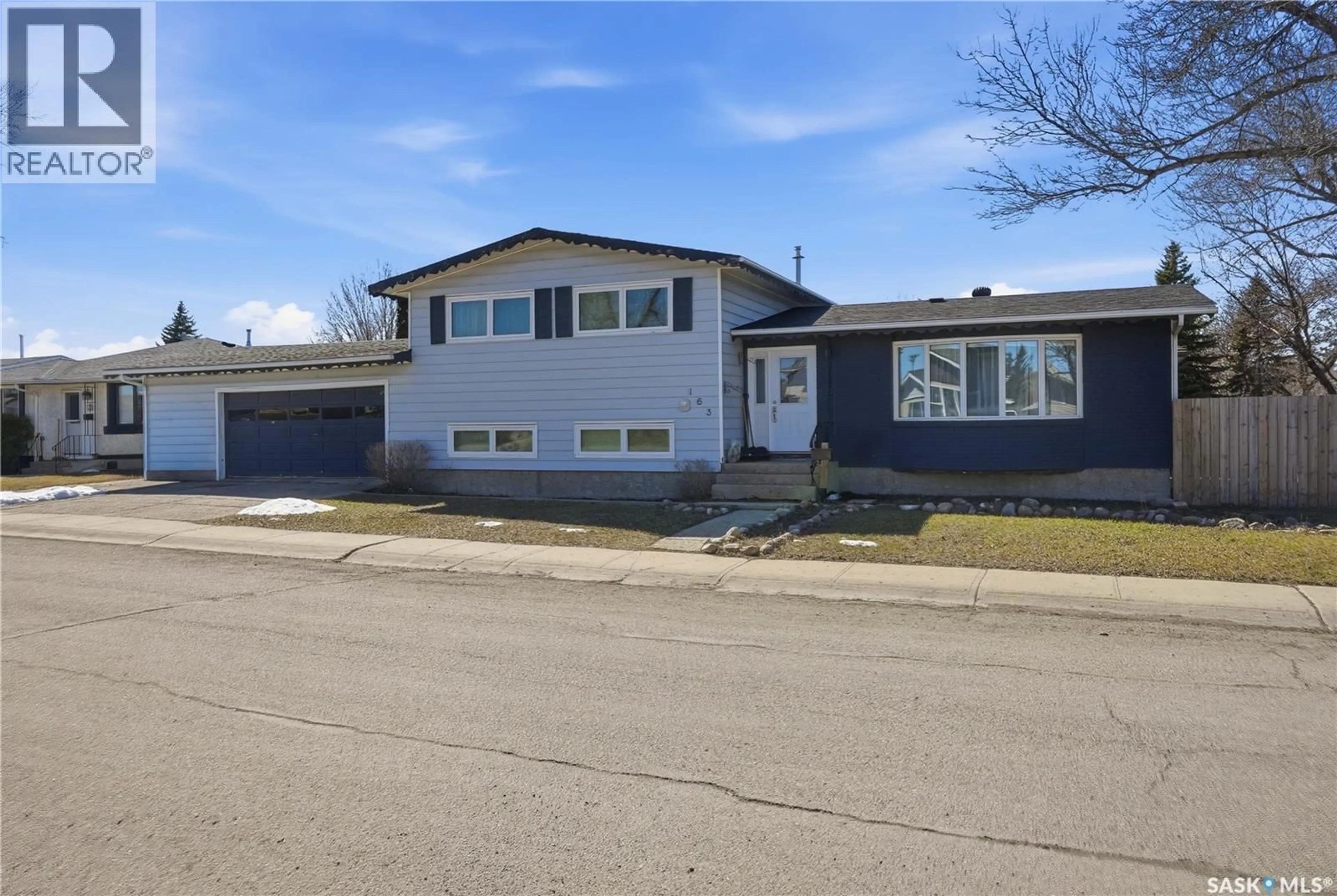 Home with vinyl exterior material, street for 163 LLOYD CRESCENT, Regina Saskatchewan S4R6B9