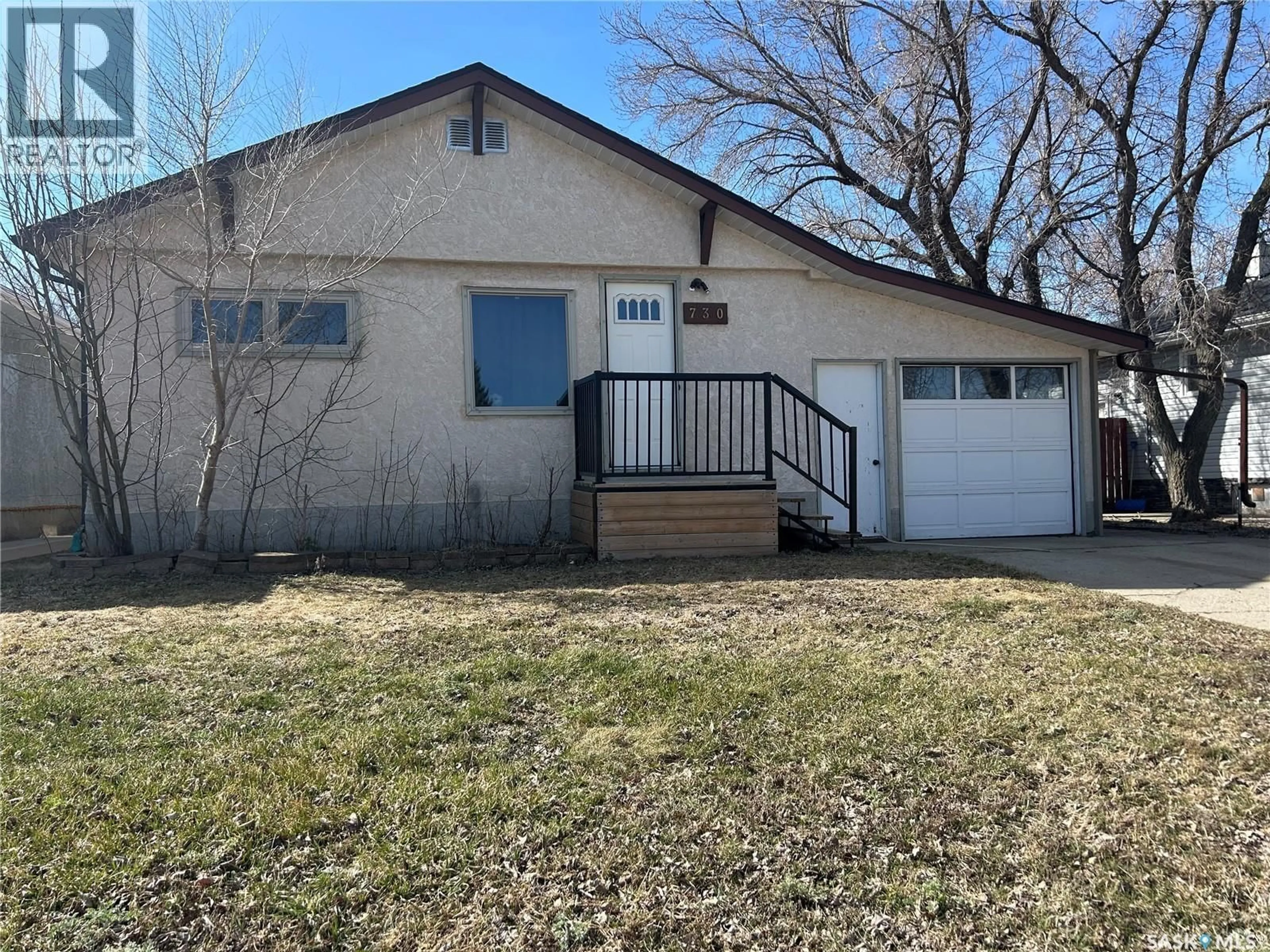 Home with vinyl exterior material, street for 730 ISABELLE STREET, Estevan Saskatchewan S4A1P9