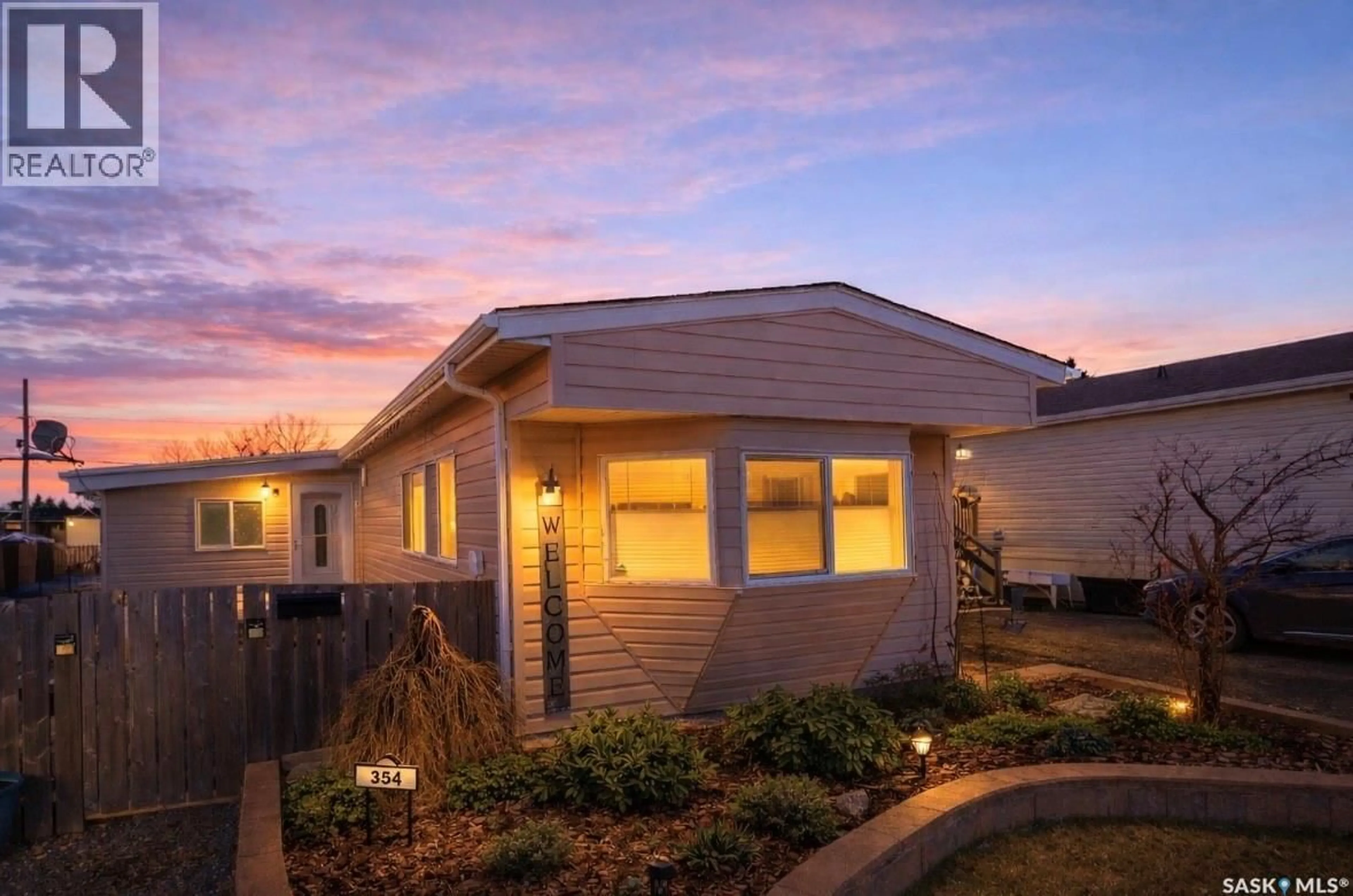 Home with vinyl exterior material, street for 354 HAWKES STREET, Balgonie Saskatchewan S0G0E0