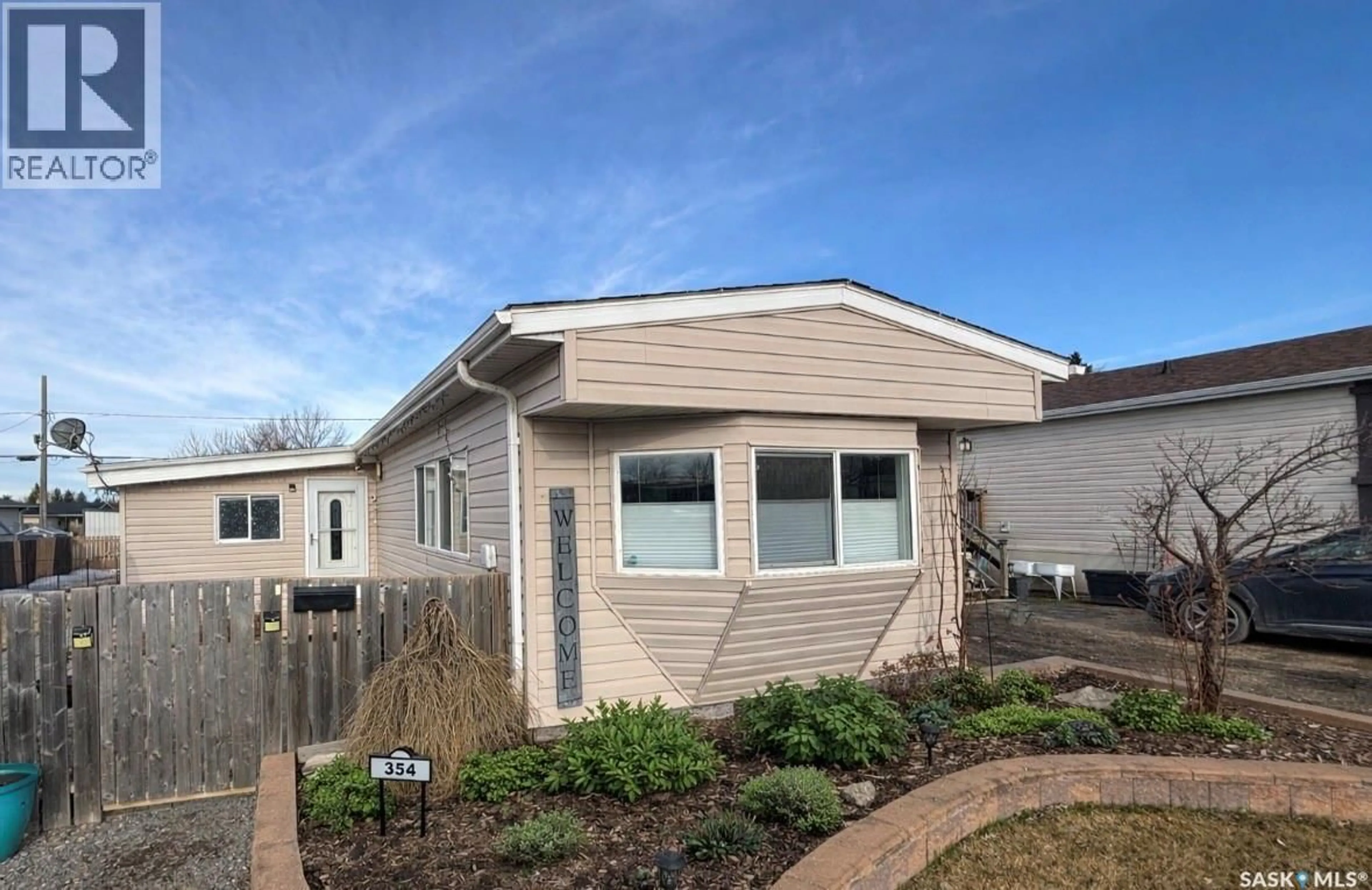 Home with vinyl exterior material, street for 354 HAWKES STREET, Balgonie Saskatchewan S0G0E0