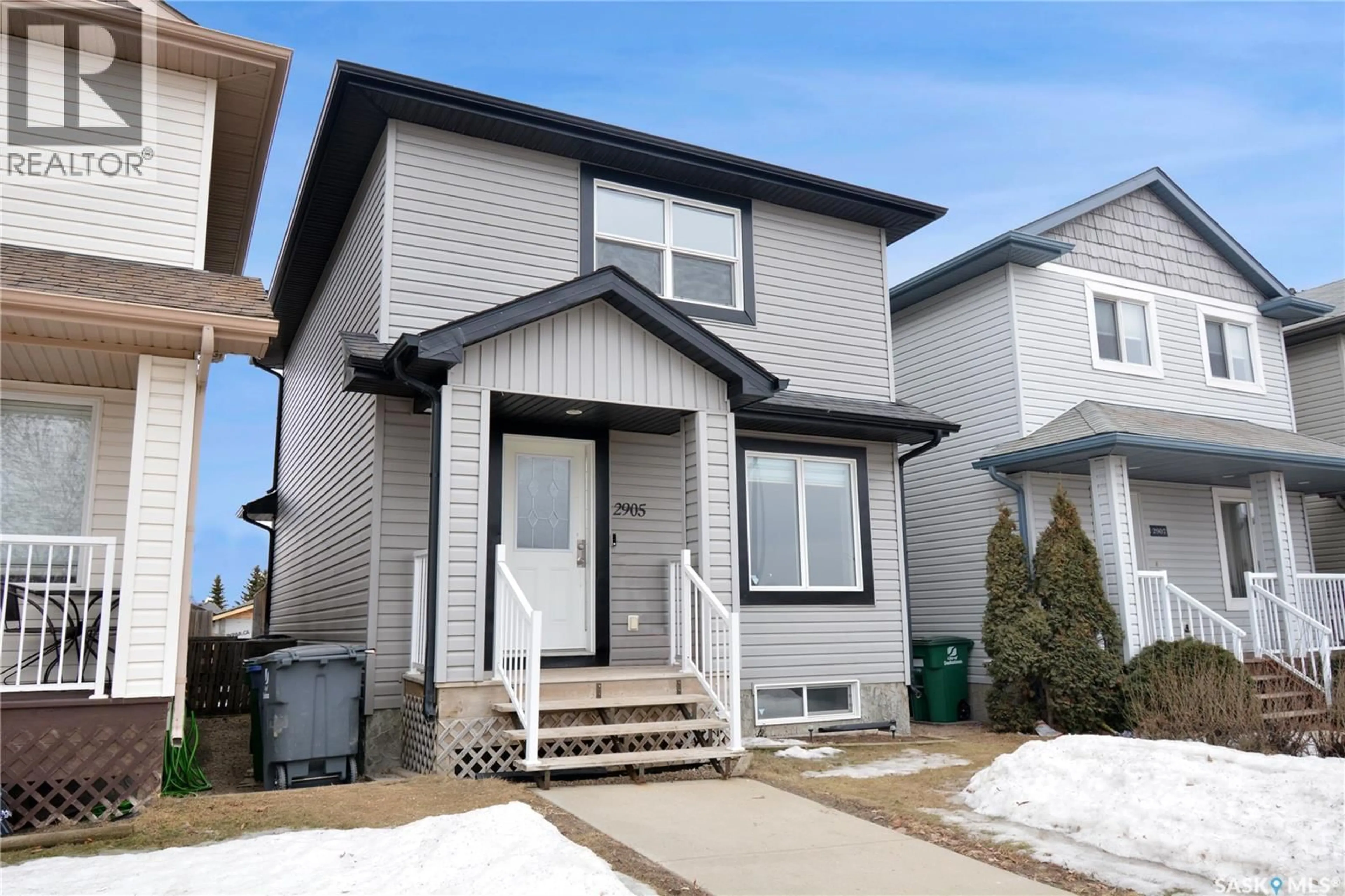 Home with vinyl exterior material, street for 2905 MCCLOCKLIN ROAD, Saskatoon Saskatchewan S7R0A1