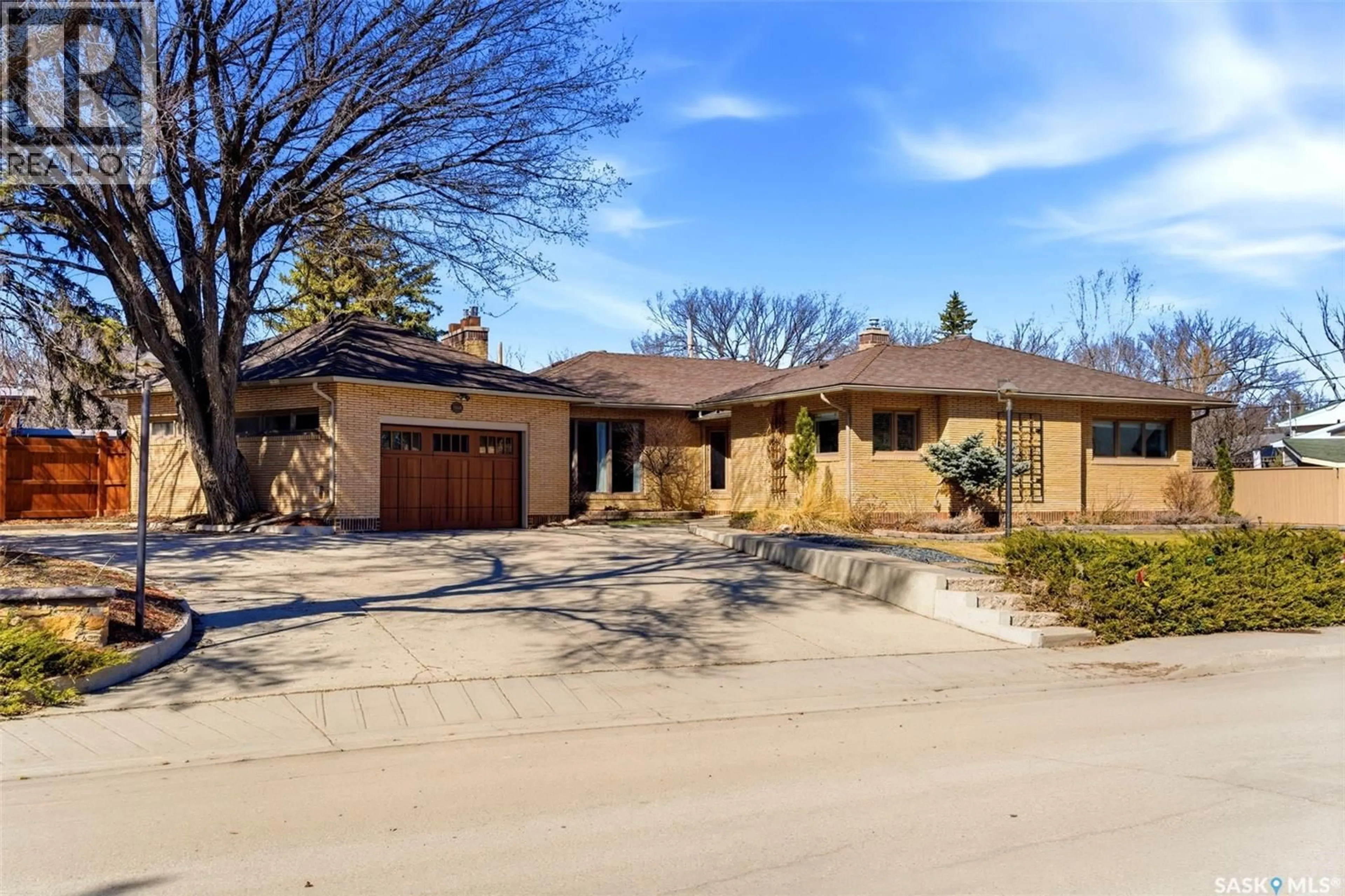 Home with brick exterior material, street for 2640 19TH AVENUE, Regina Saskatchewan S4T1X1