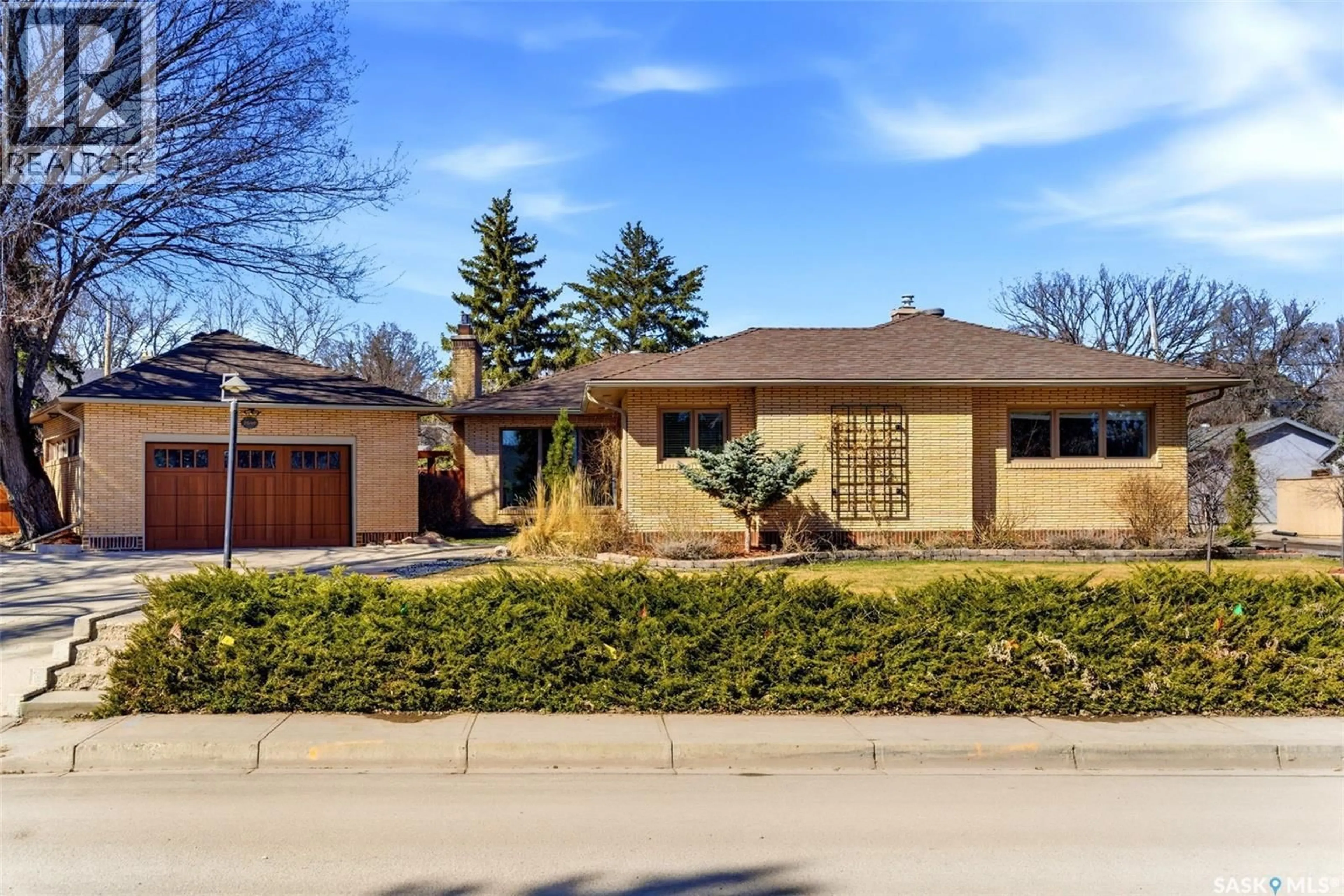 Home with brick exterior material, street for 2640 19TH AVENUE, Regina Saskatchewan S4T1X1