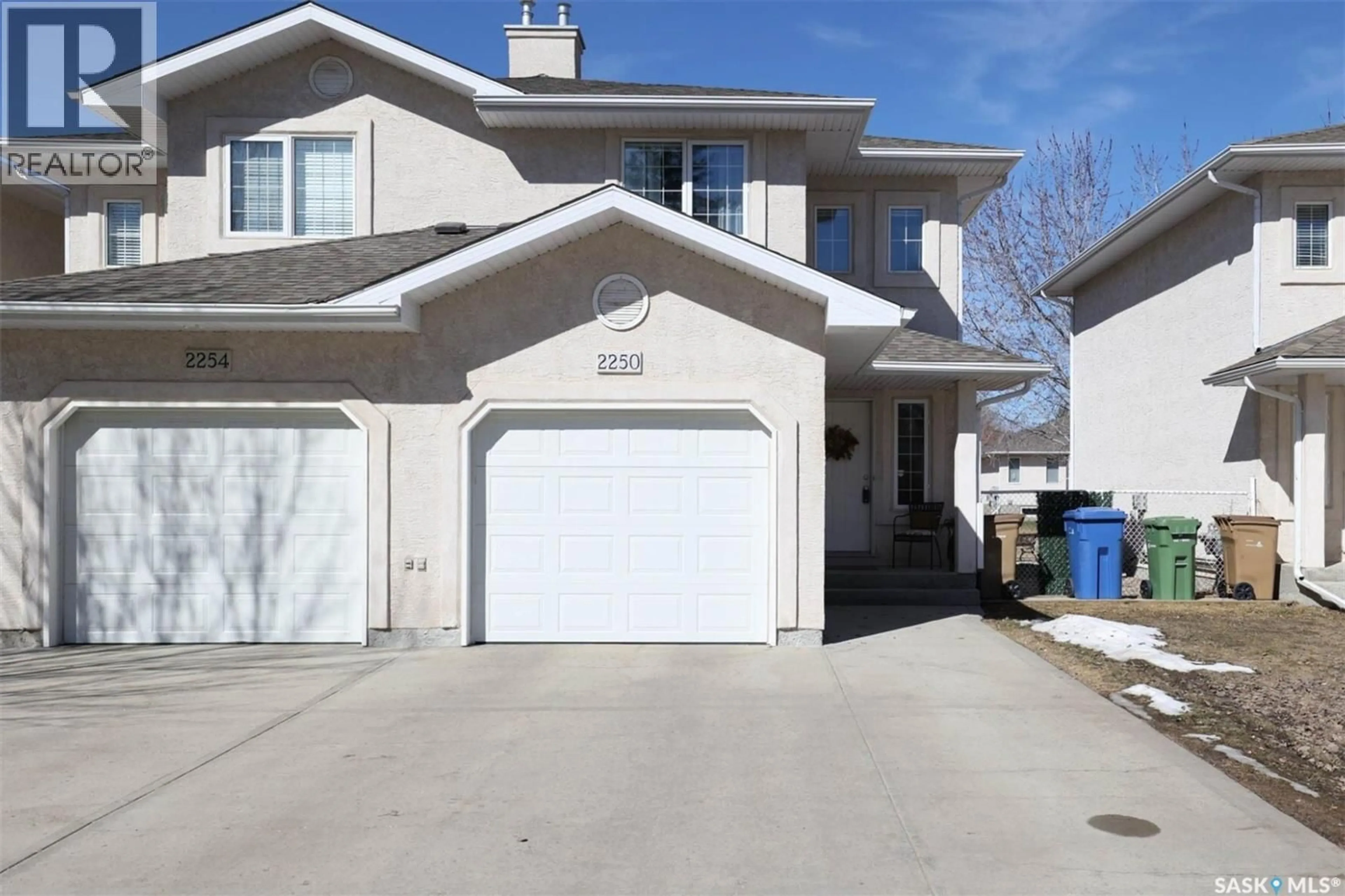 Home with vinyl exterior material, street for 2250 ATKINSON STREET, Regina Saskatchewan S4N7R2