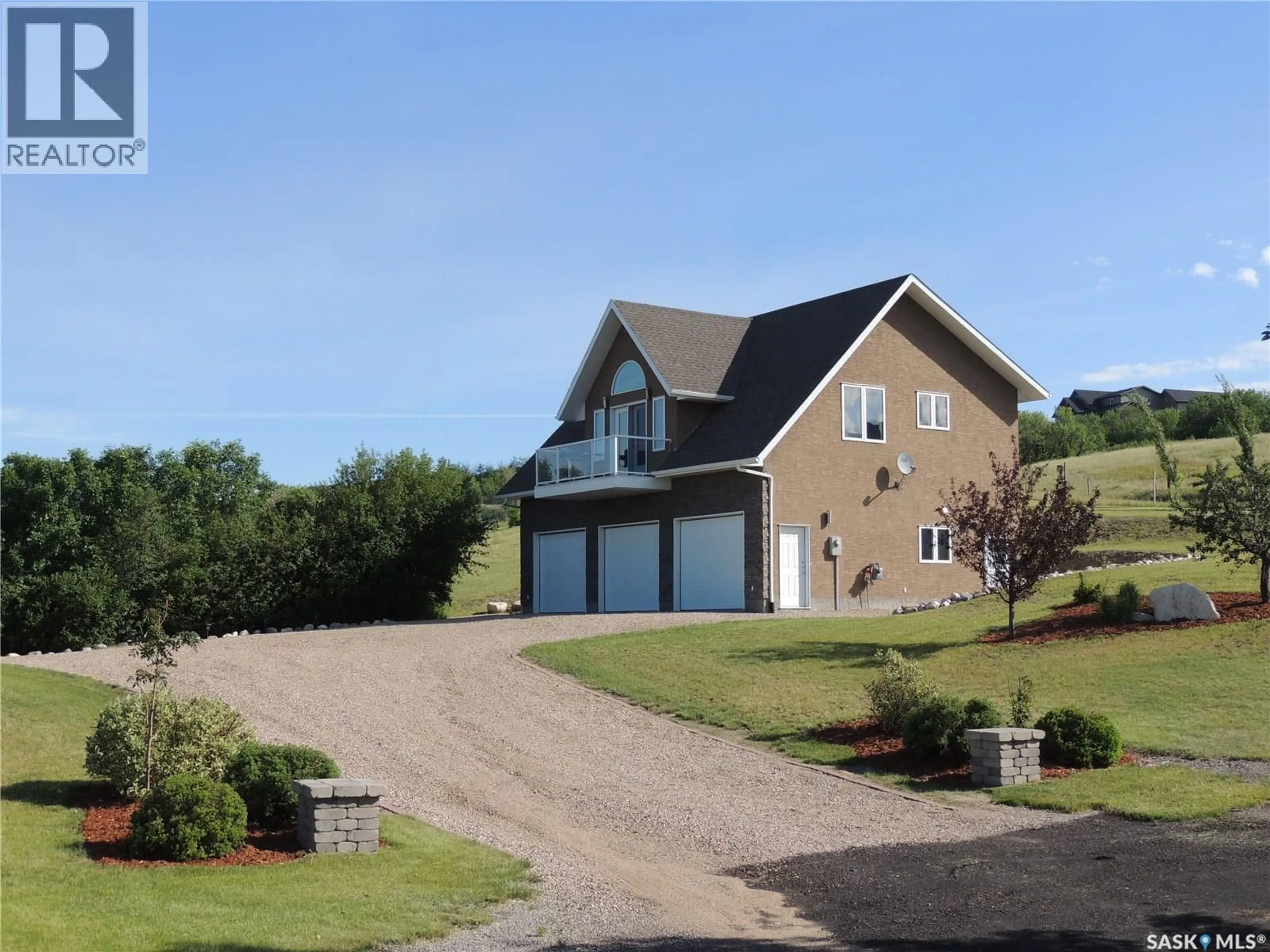 A pic from outside/outdoor area/front of a property/back of a property/a pic from drone, unknown for 17 ROCK RIDGE, Longlaketon Rm No. 219 Saskatchewan S0G4L0