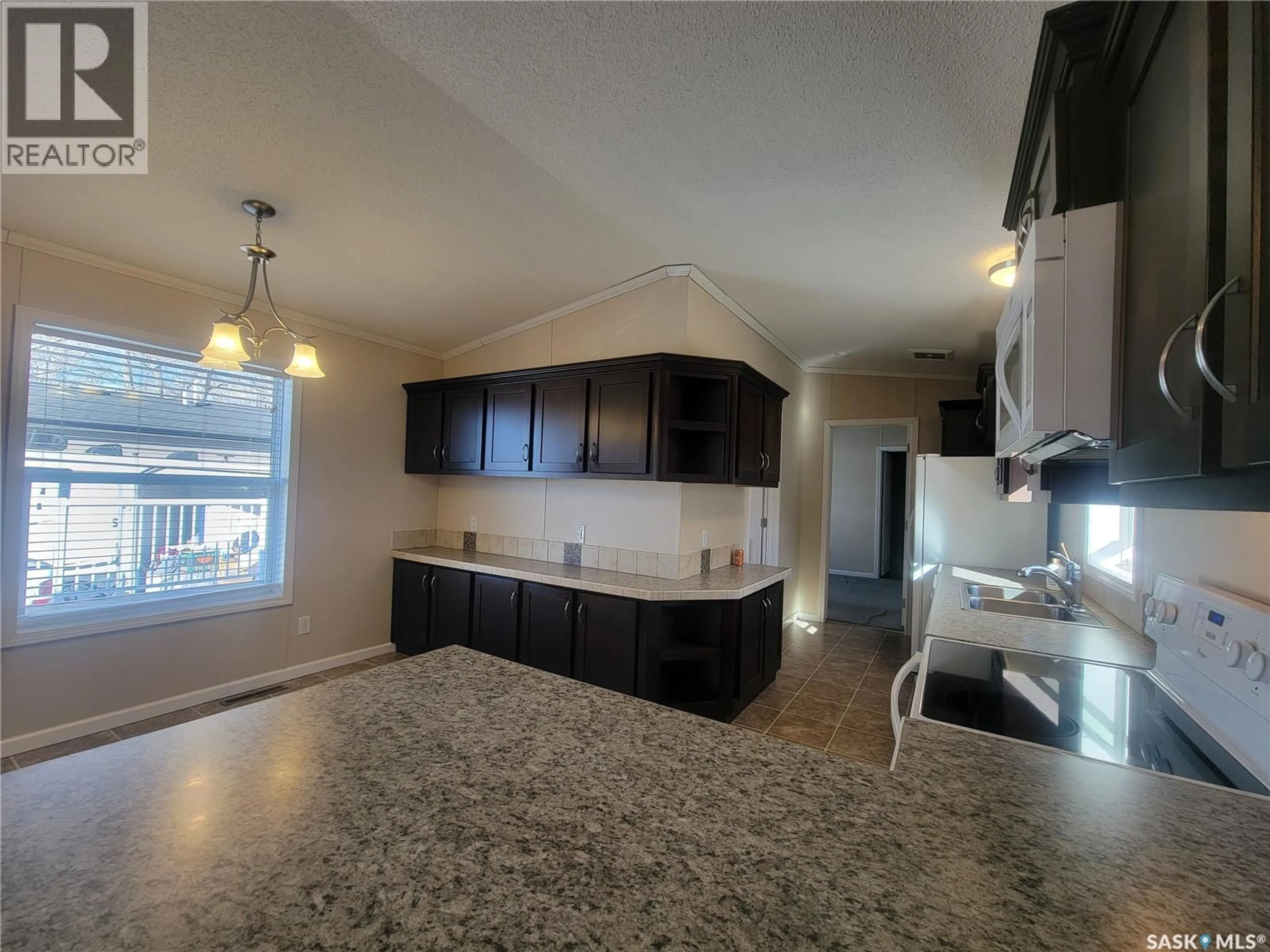 Open concept kitchen, ceramic/tile floor for 414 LONSDALE STREET, Luseland Saskatchewan S0L2A0