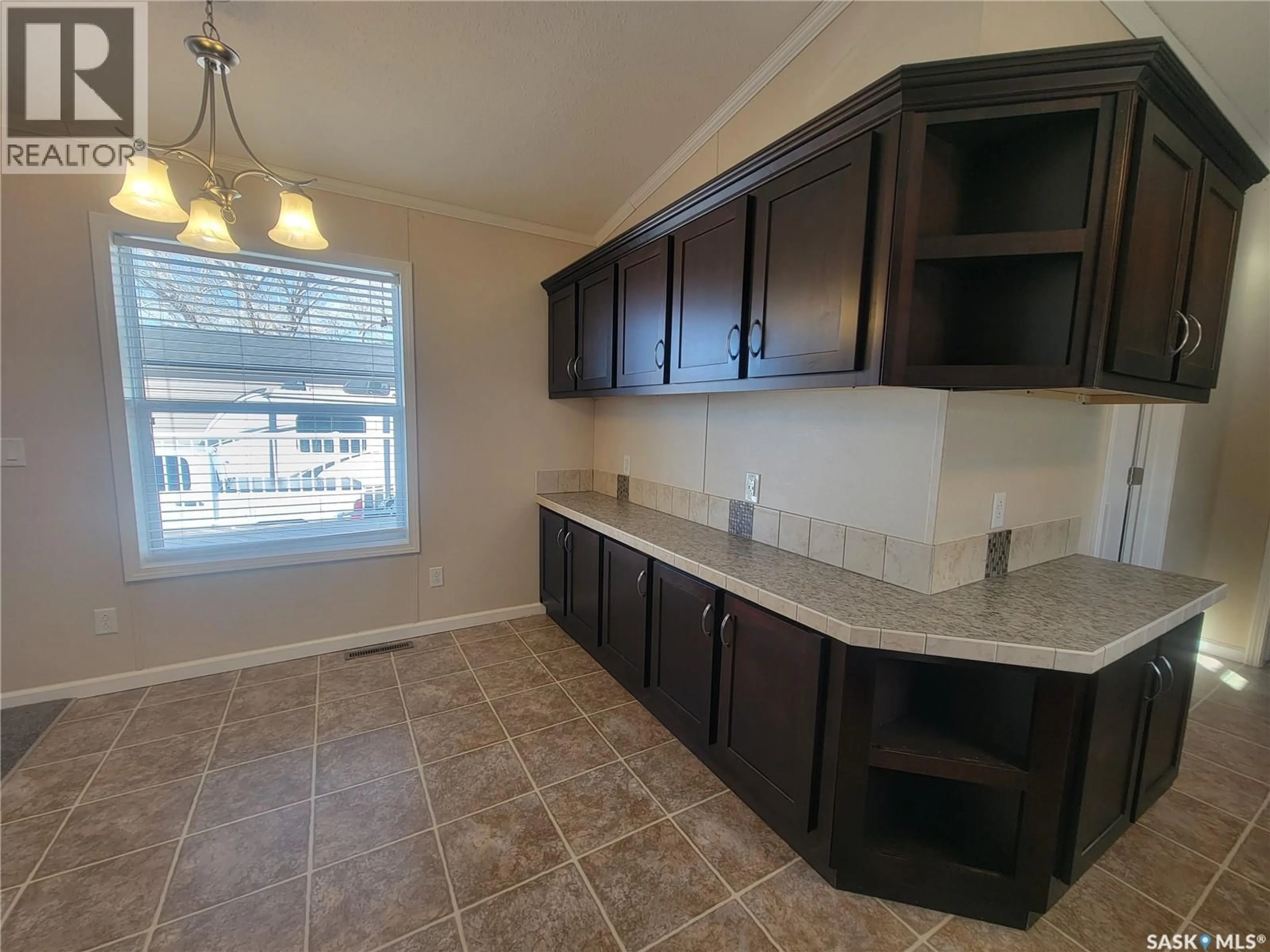 Open concept kitchen, ceramic/tile floor for 414 LONSDALE STREET, Luseland Saskatchewan S0L2A0