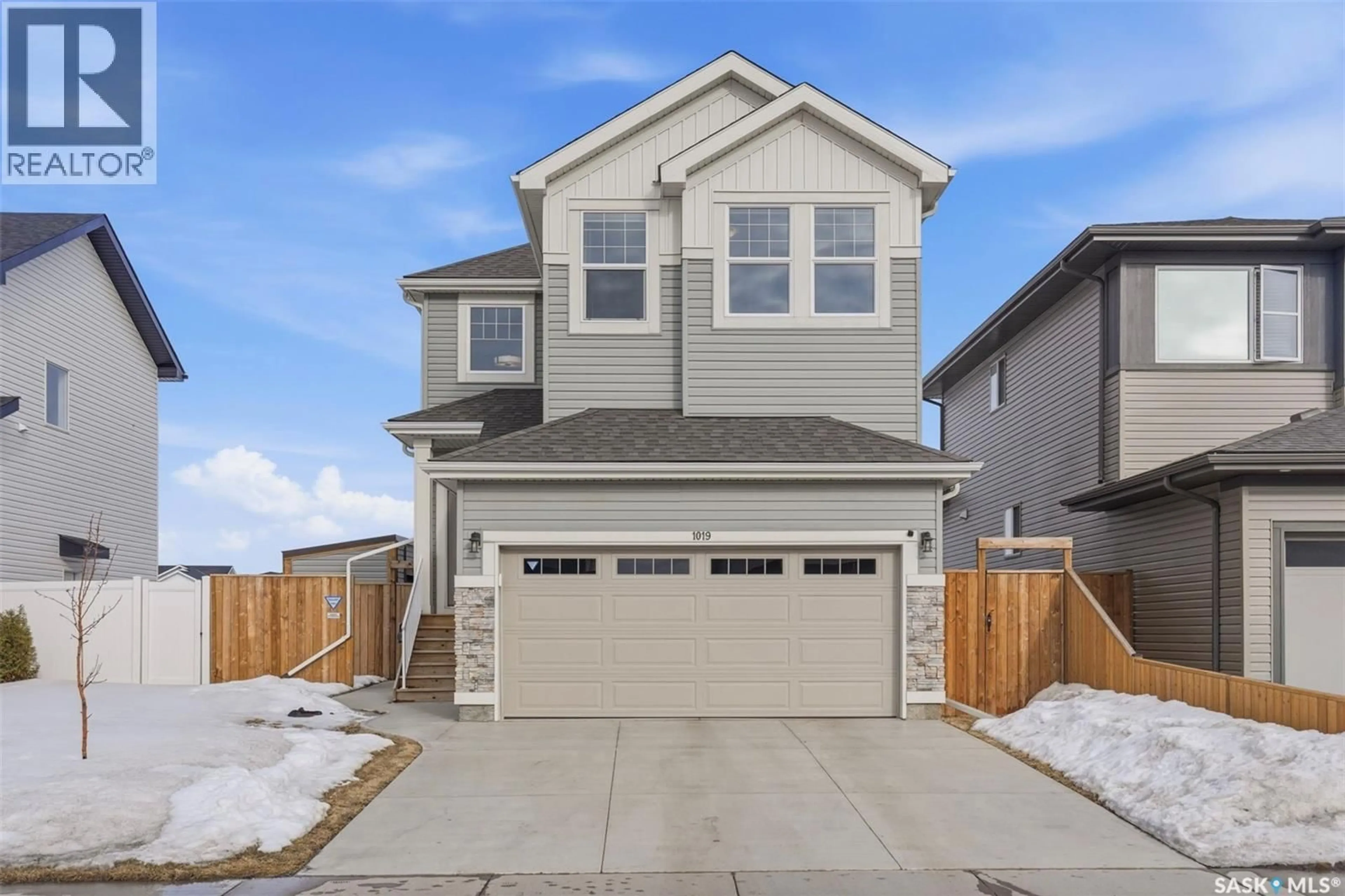 Home with vinyl exterior material, street for 1019 CHILDERS COURT, Saskatoon Saskatchewan S7L6T8