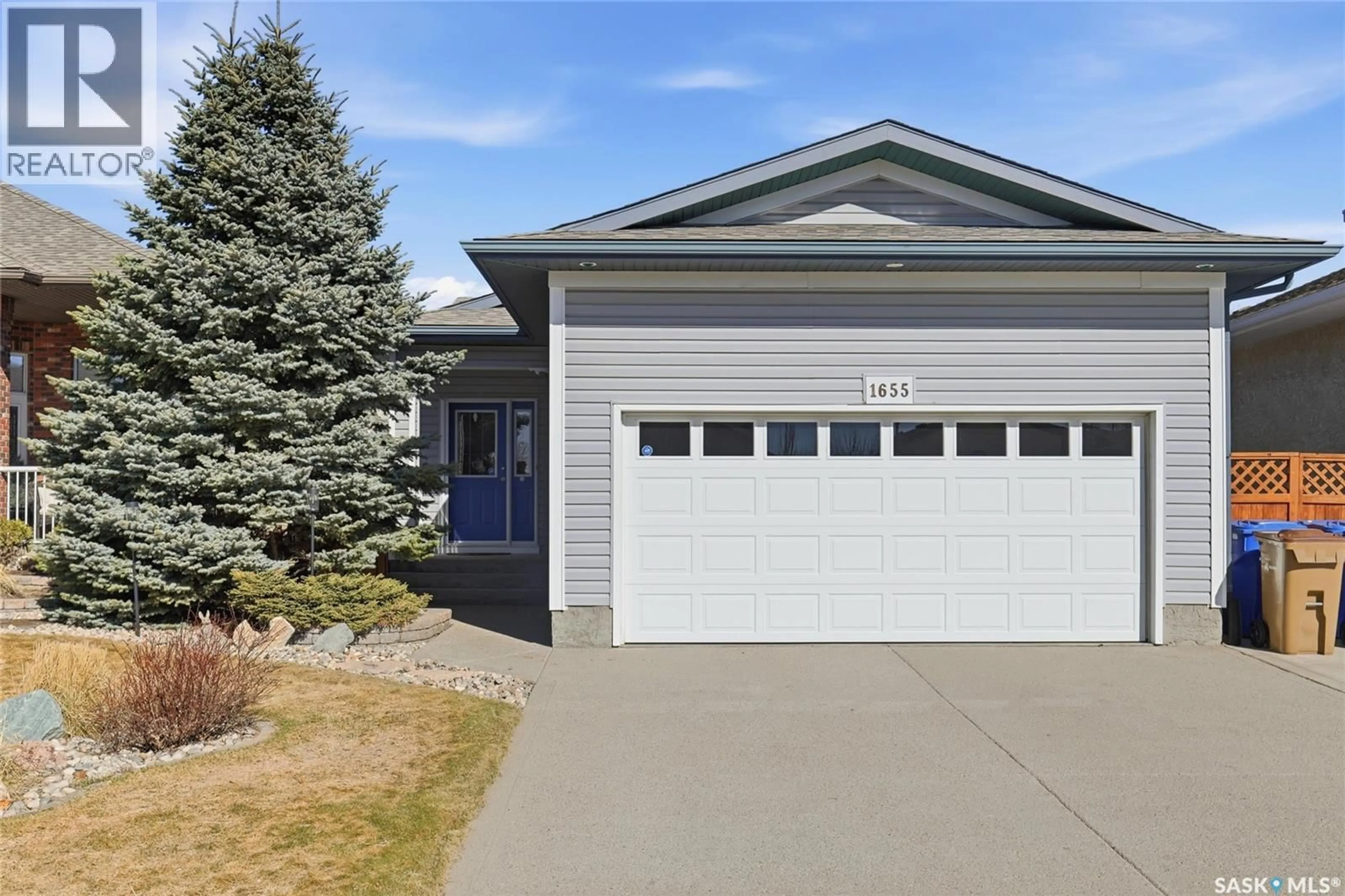 Home with vinyl exterior material, street for 1655 WINGERT DRIVE, Regina Saskatchewan S4X4P3