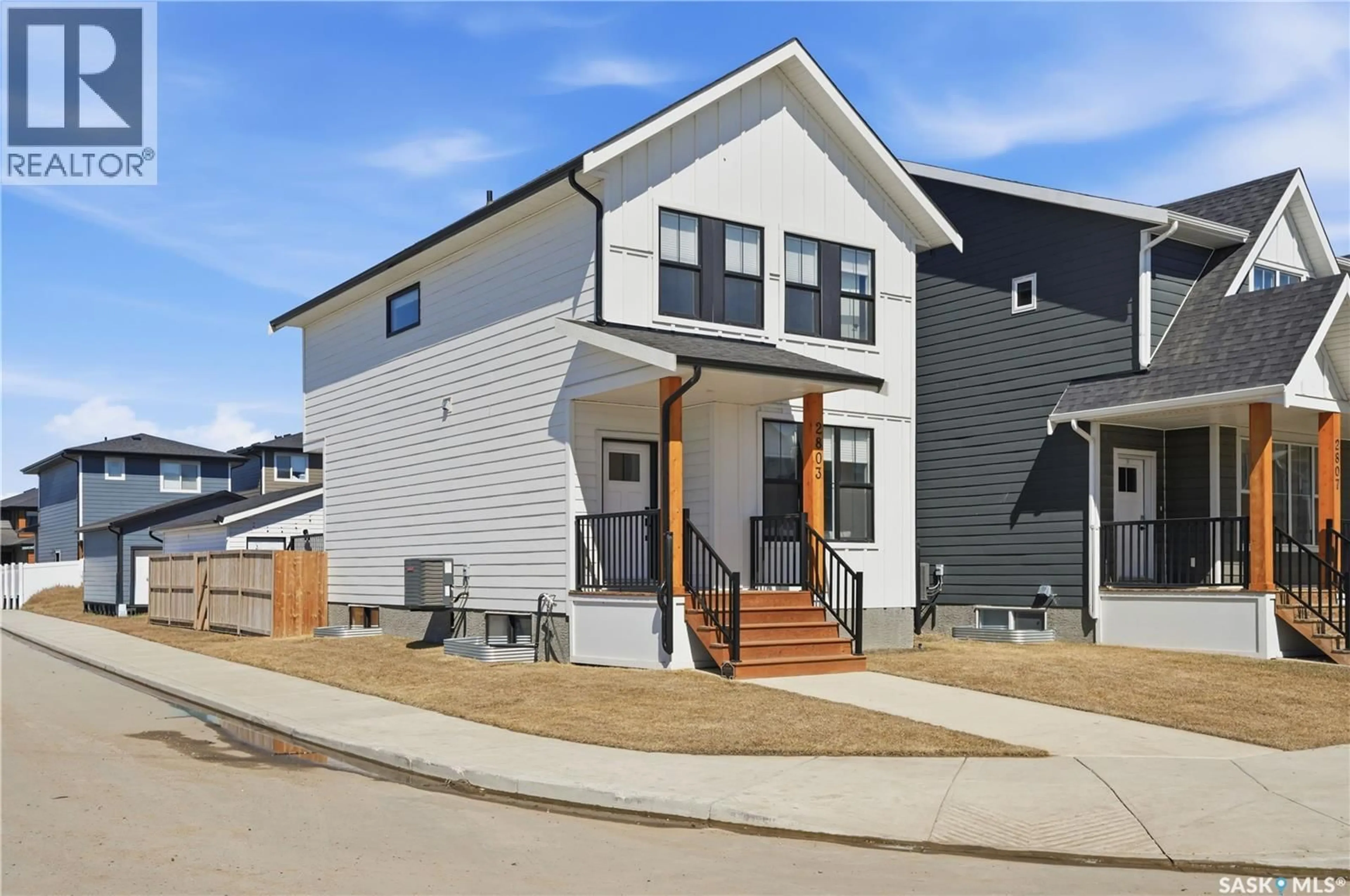 Home with vinyl exterior material, street for 2803 ROSEWOOD DRIVE, Saskatoon Saskatchewan S7V1R4