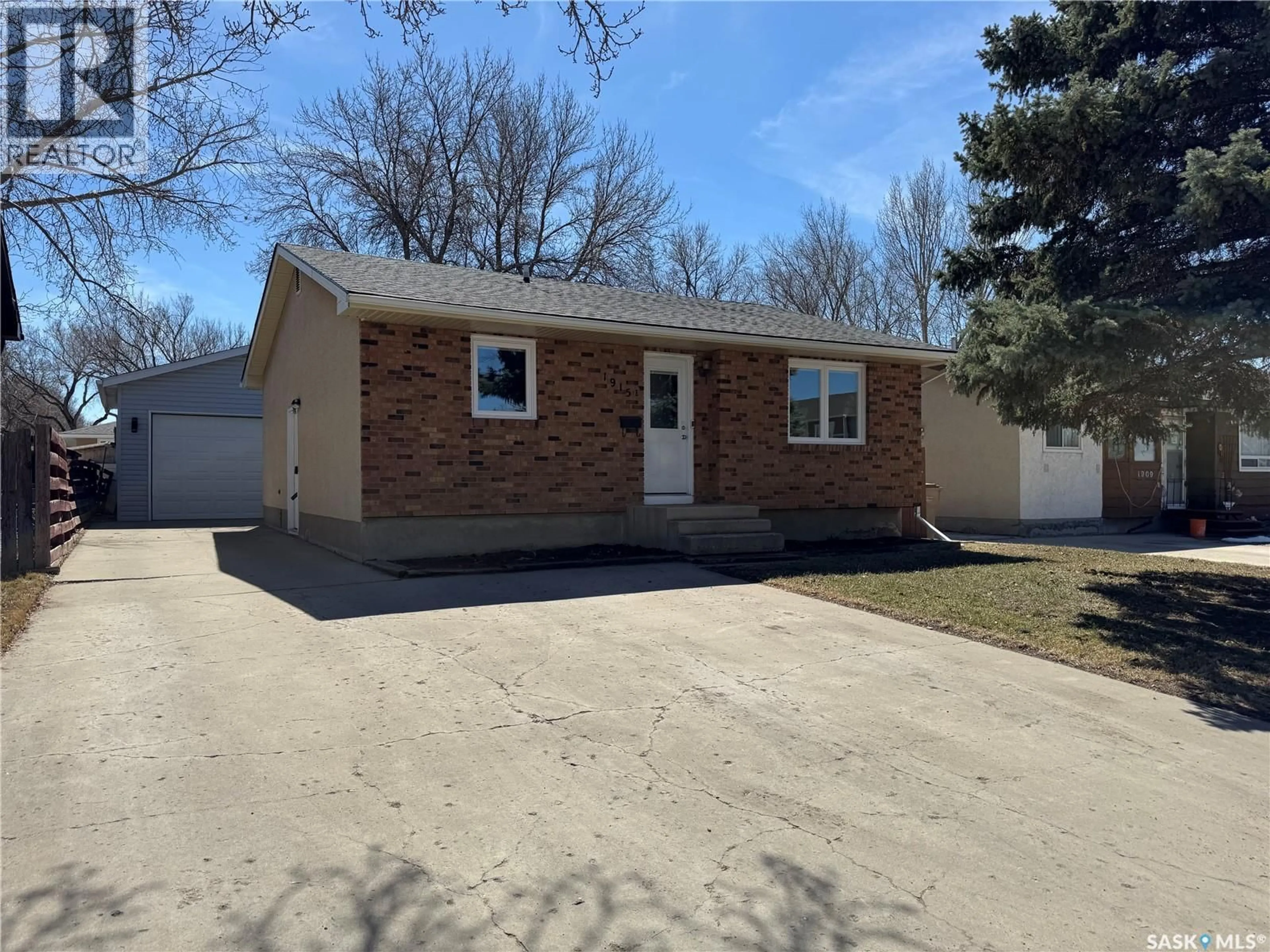 Home with brick exterior material, street for 1915 7TH AVENUE, Regina Saskatchewan S4N4M7