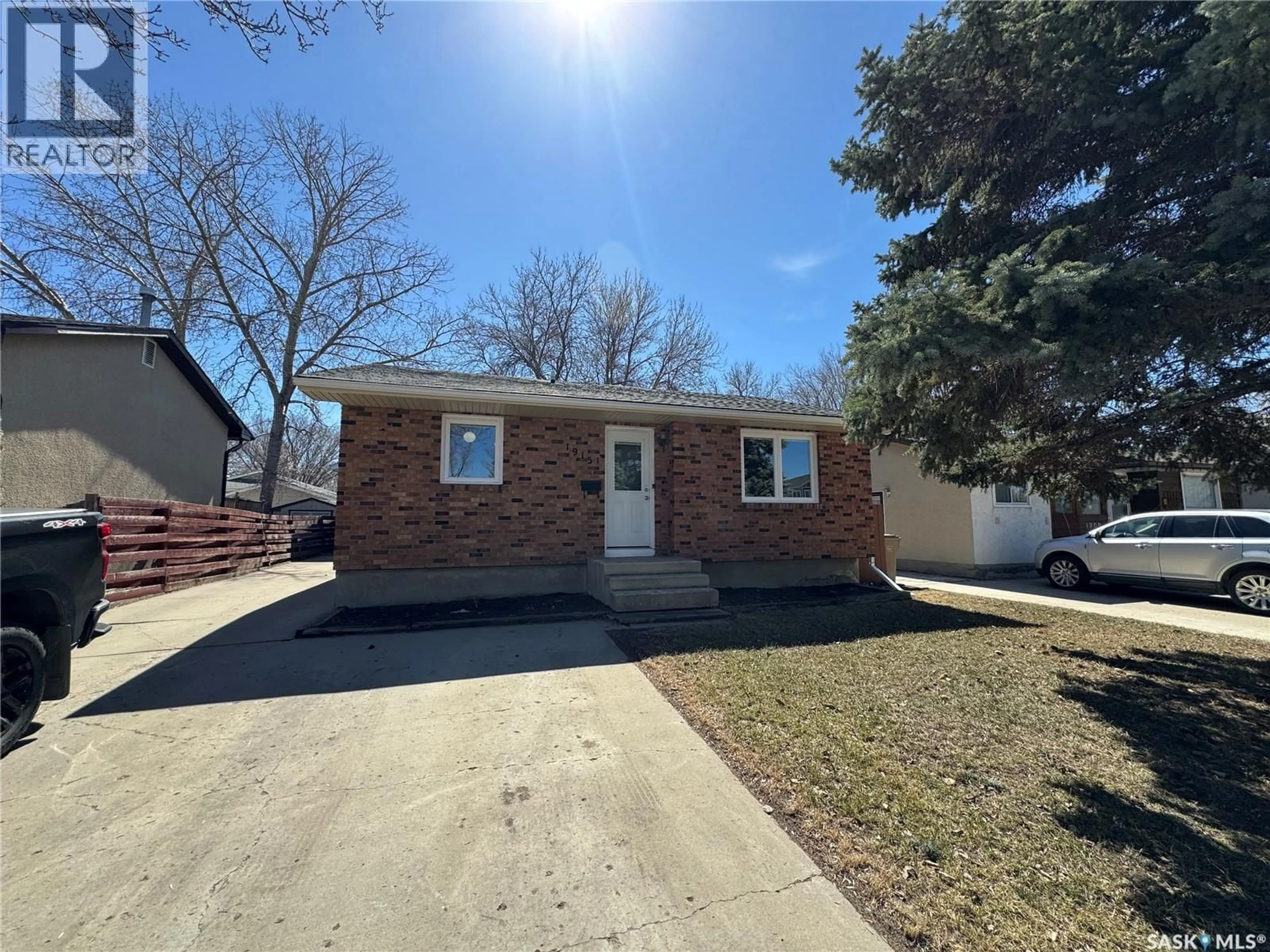 Home with brick exterior material, street for 1915 7TH AVENUE, Regina Saskatchewan S4N4M7