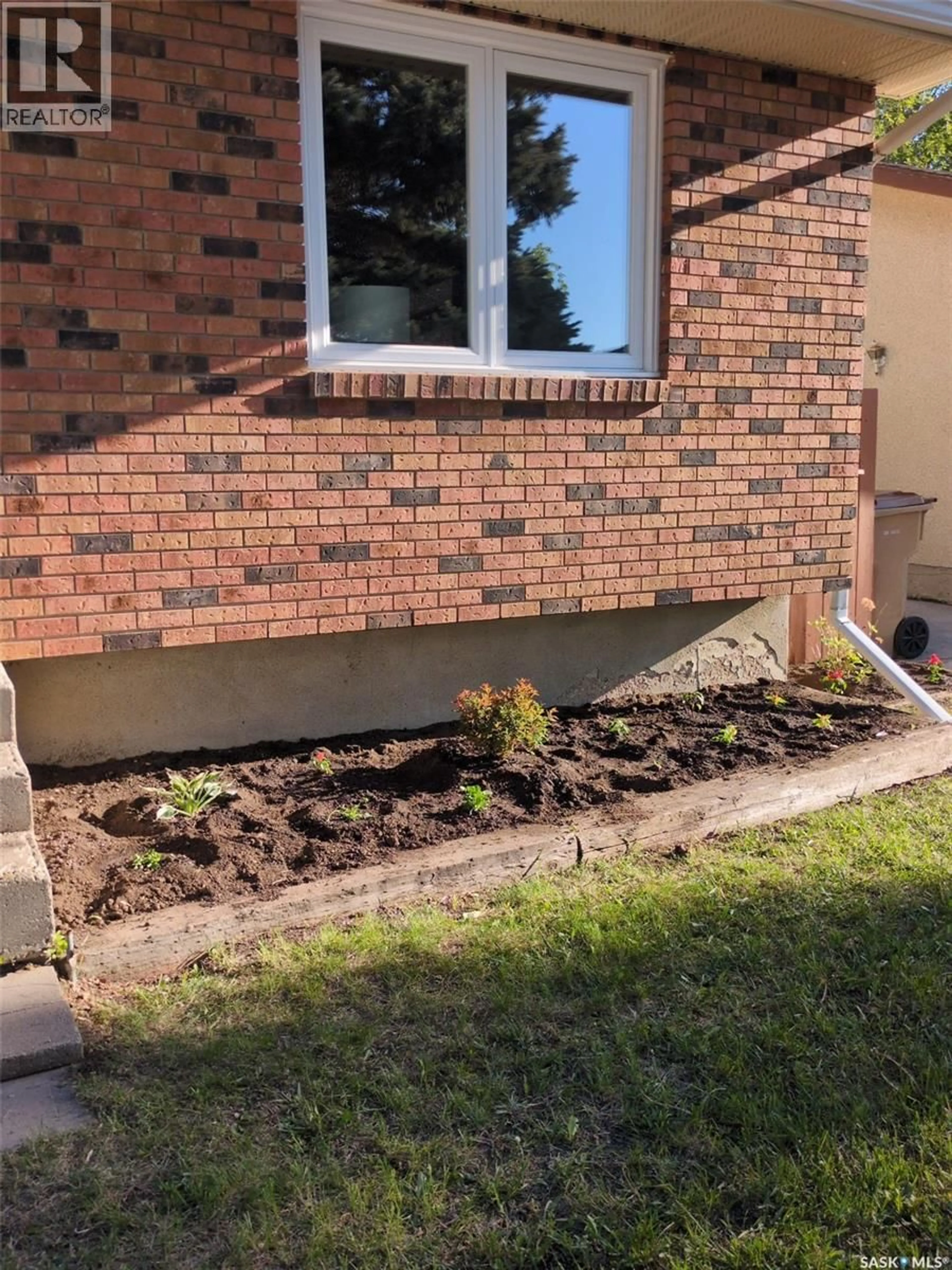 Home with brick exterior material, street for 1915 7TH AVENUE, Regina Saskatchewan S4N4M7