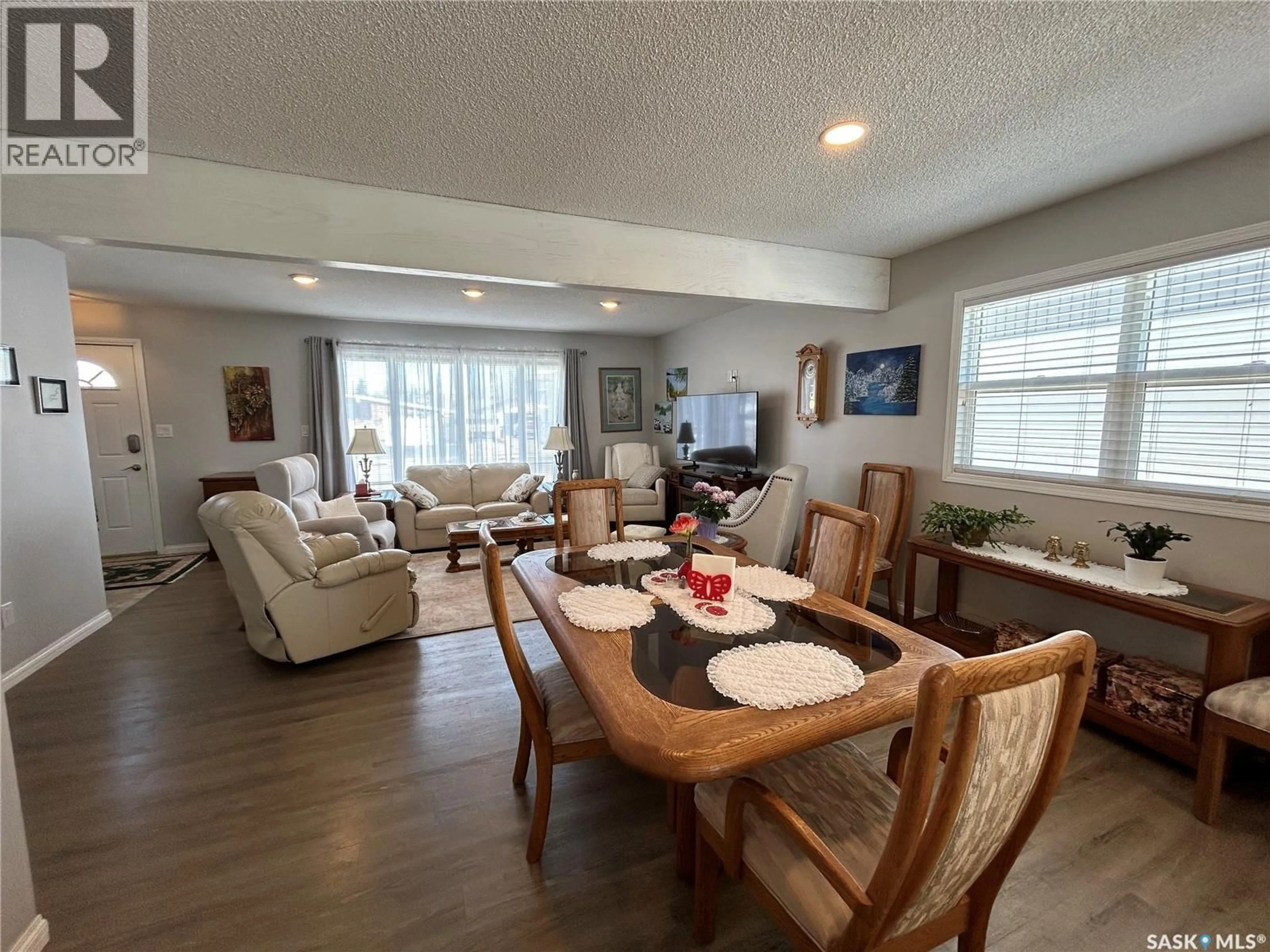 Living room with furniture, wood/laminate floor for 4 KING CRESCENT, Humboldt Saskatchewan S0K2A0