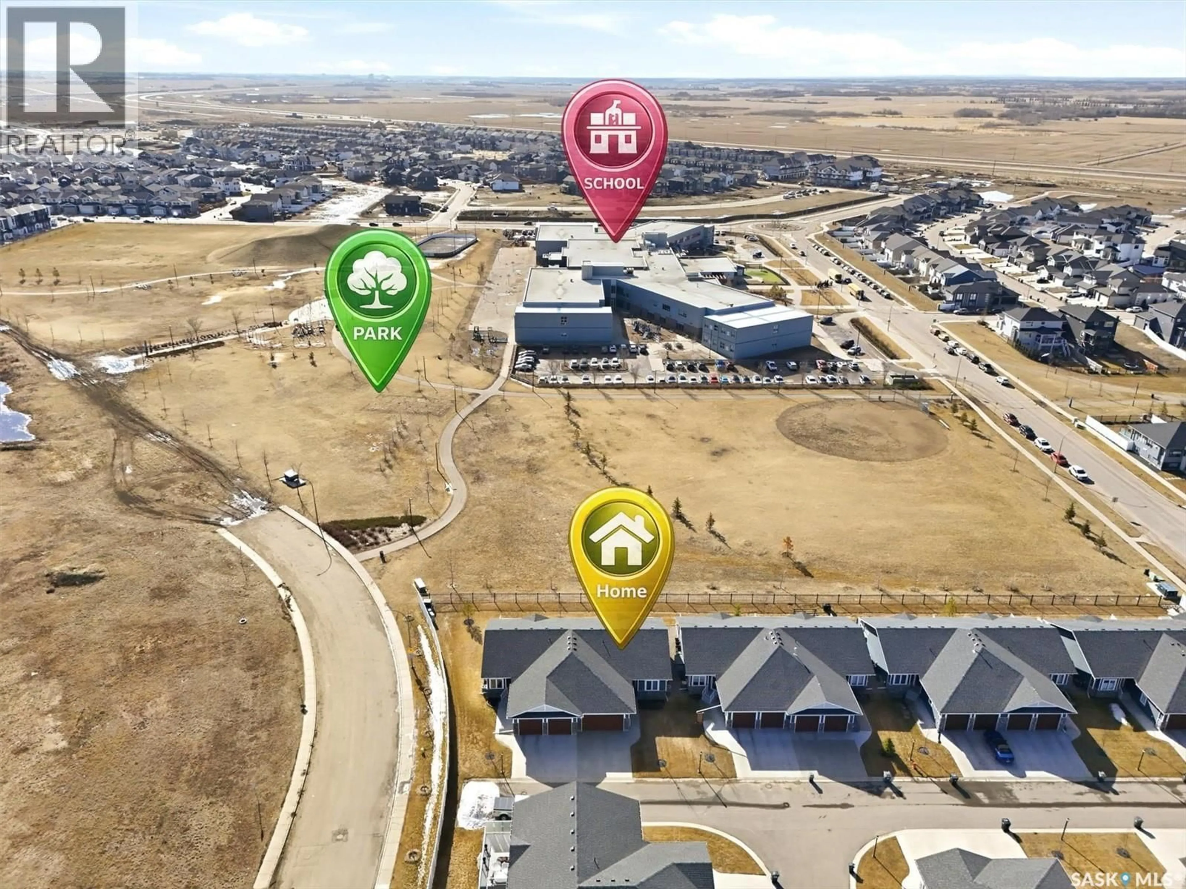 A pic from outside/outdoor area/front of a property/back of a property/a pic from drone, street for 315 - 13 OLSON LANE, Saskatoon Saskatchewan S7V0R8