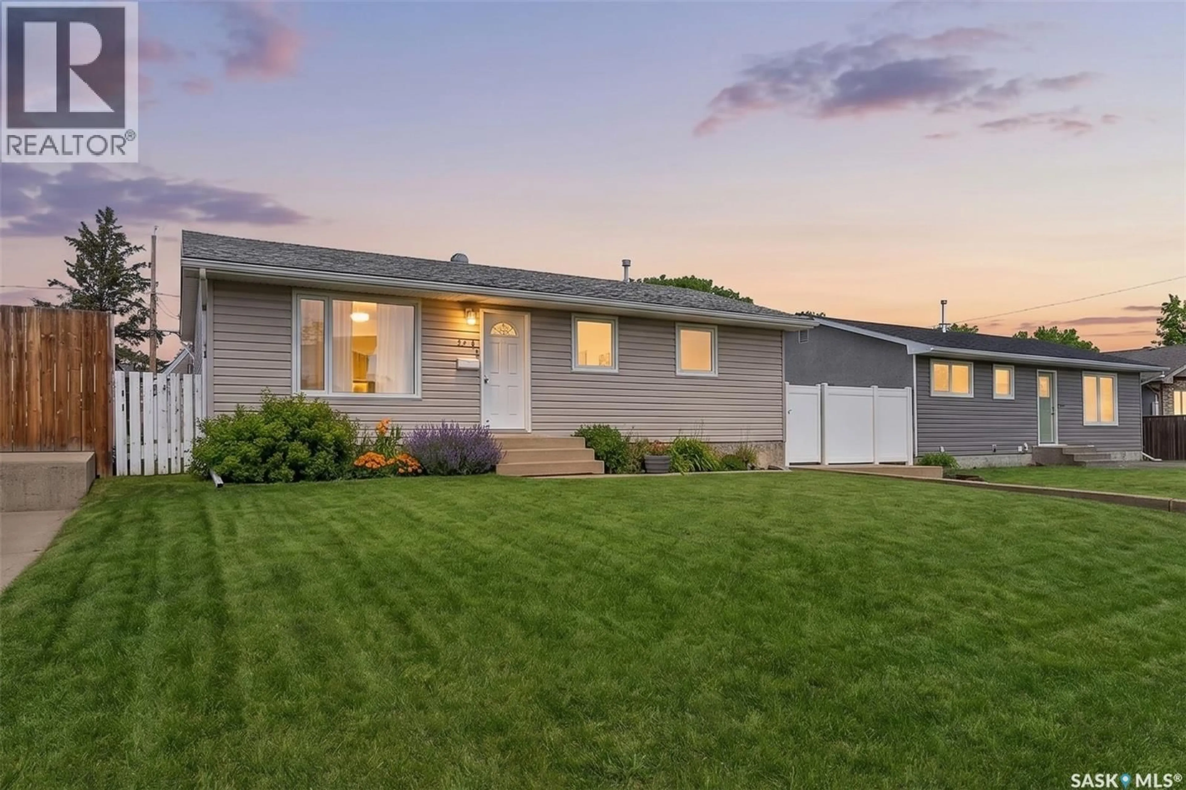 Home with vinyl exterior material, street for 1312 STADACONA STREET, Moose Jaw Saskatchewan S6H6M9